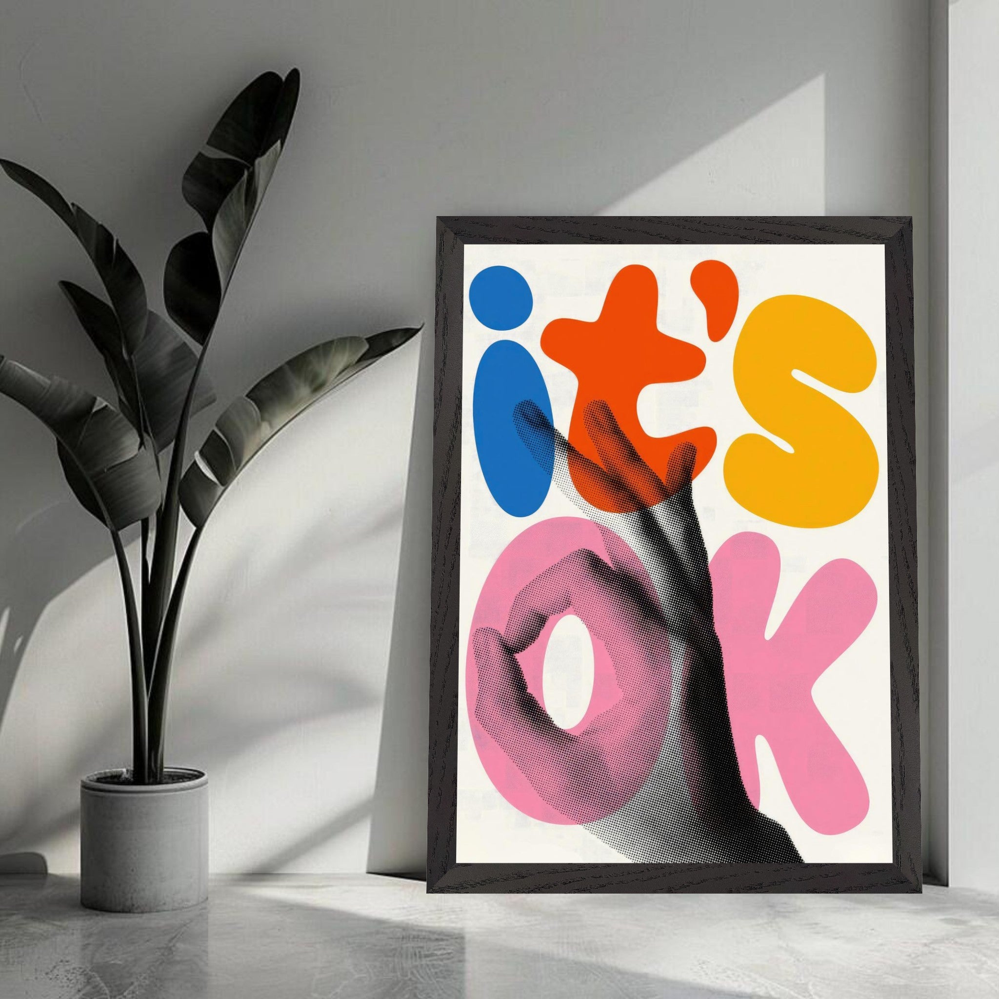 Retro abstract pop art print featuring bold colors and hand gesture, framed artwork with 'it's OK' typography.