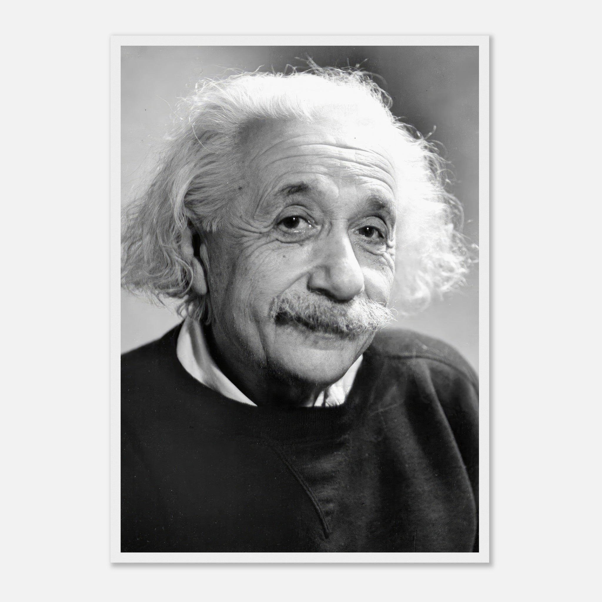 Black-and-white framed print of Albert Einstein from 1946, showcasing his thoughtful expression and iconic hairstyle.
