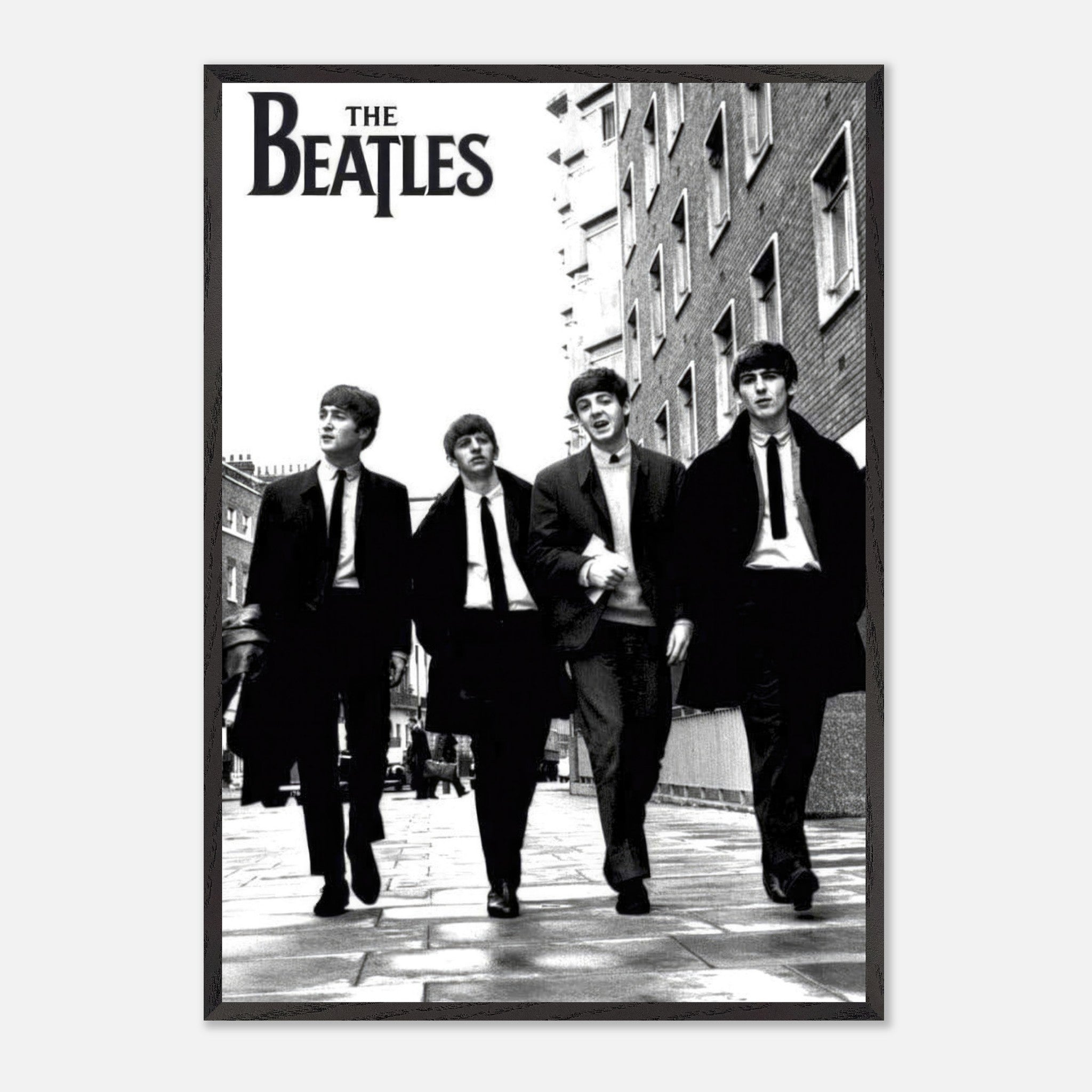 The Beatles Cover Vintage Framed Print featuring iconic band walking in black and white photo.