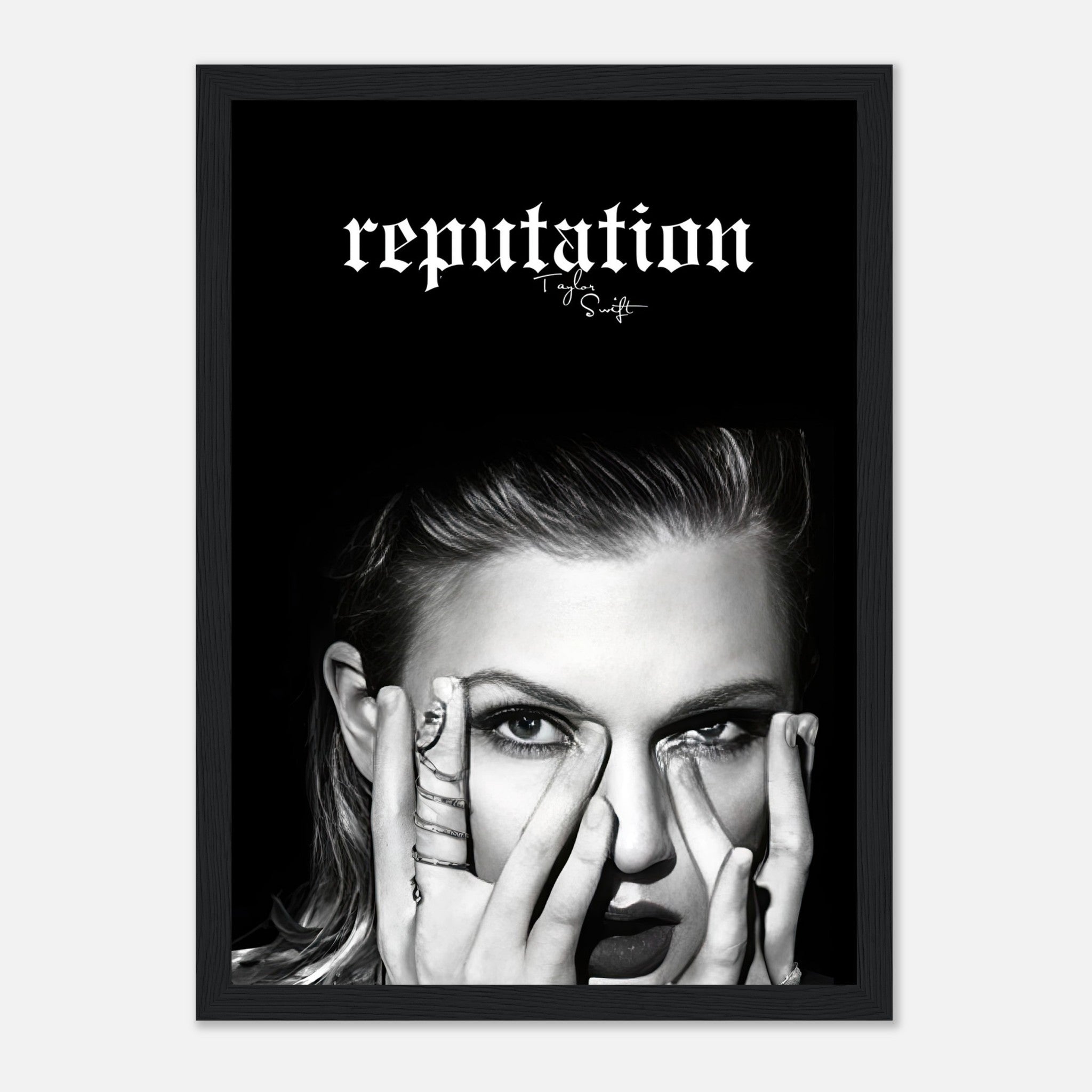 Taylor Swift Reputation framed print featuring bold black-and-white imagery and striking minimalist design.