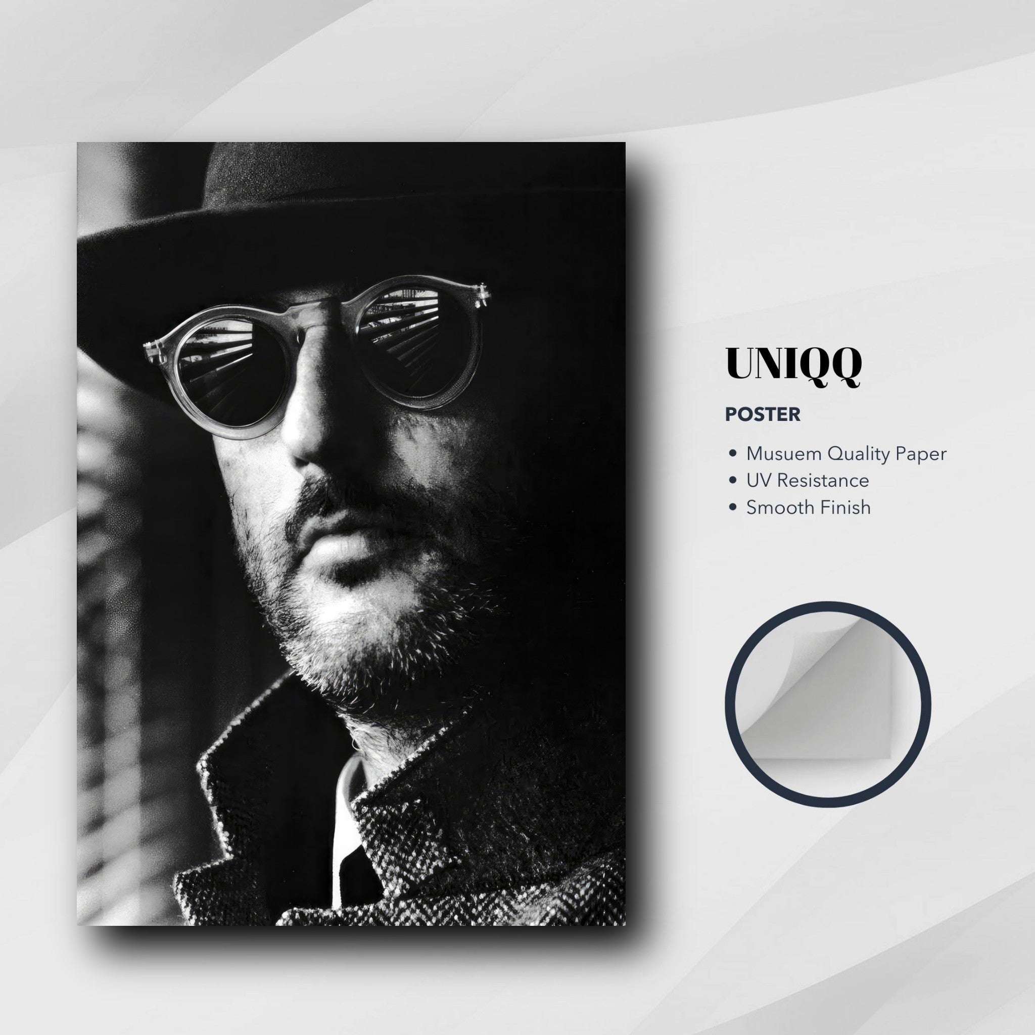 Jean Reno Leon Photography poster showcasing a black-and-white portrait with sunglasses and a stylish coat.