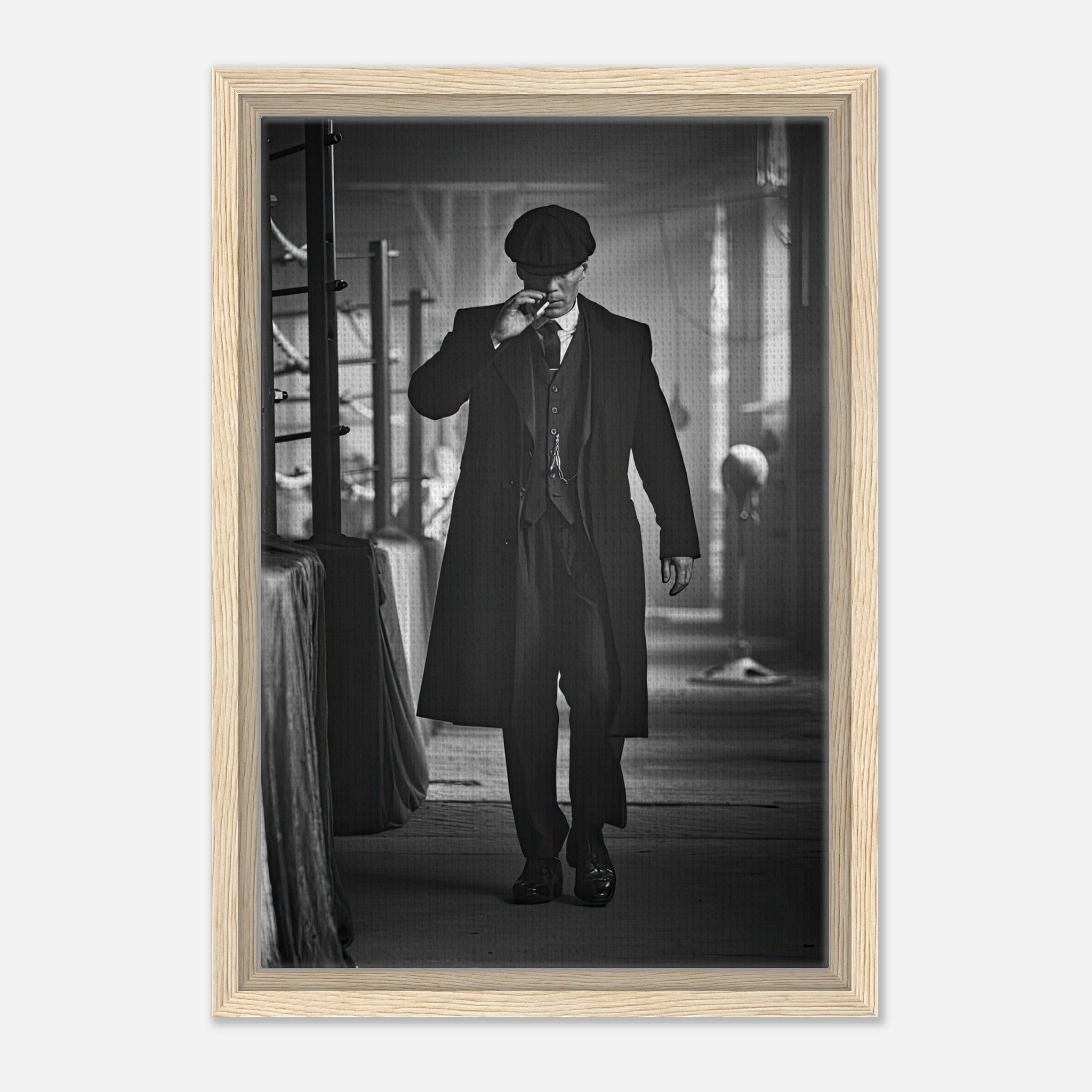 Tommy Shelby from Peaky Blinders in a stylish black and white framed canvas print, exuding a commanding presence.
