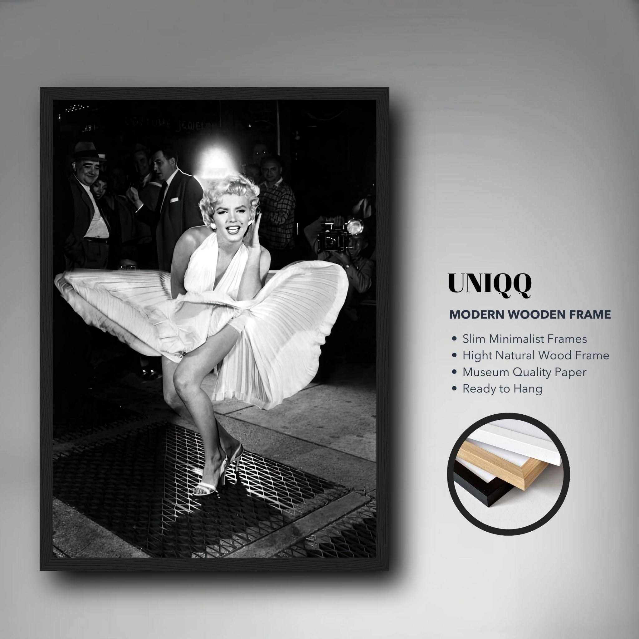 Framed print of Marilyn Monroe in white dress, iconic wind-blown moment, stylish minimalist wooden frame, museum quality.