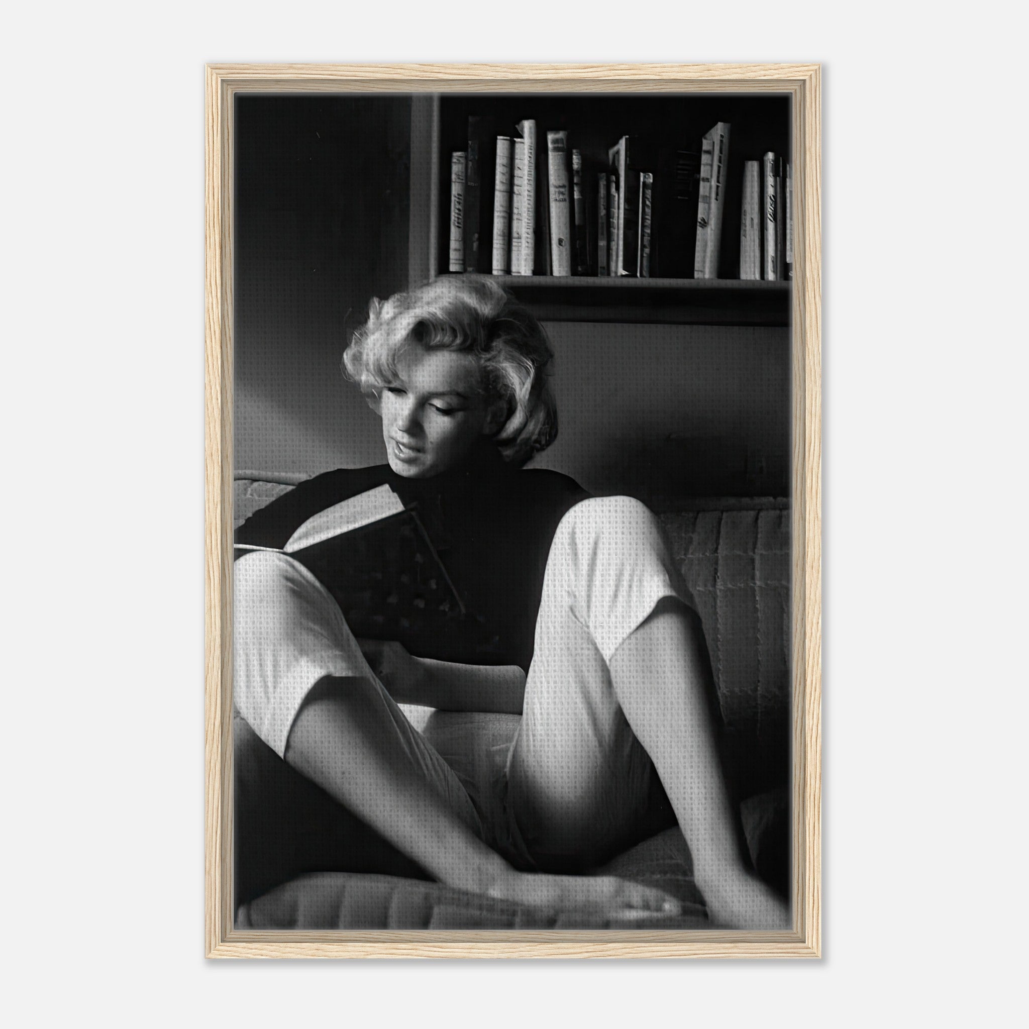 Marilyn Monroe reading at home, black-and-white framed canvas print, elegant vintage decor.