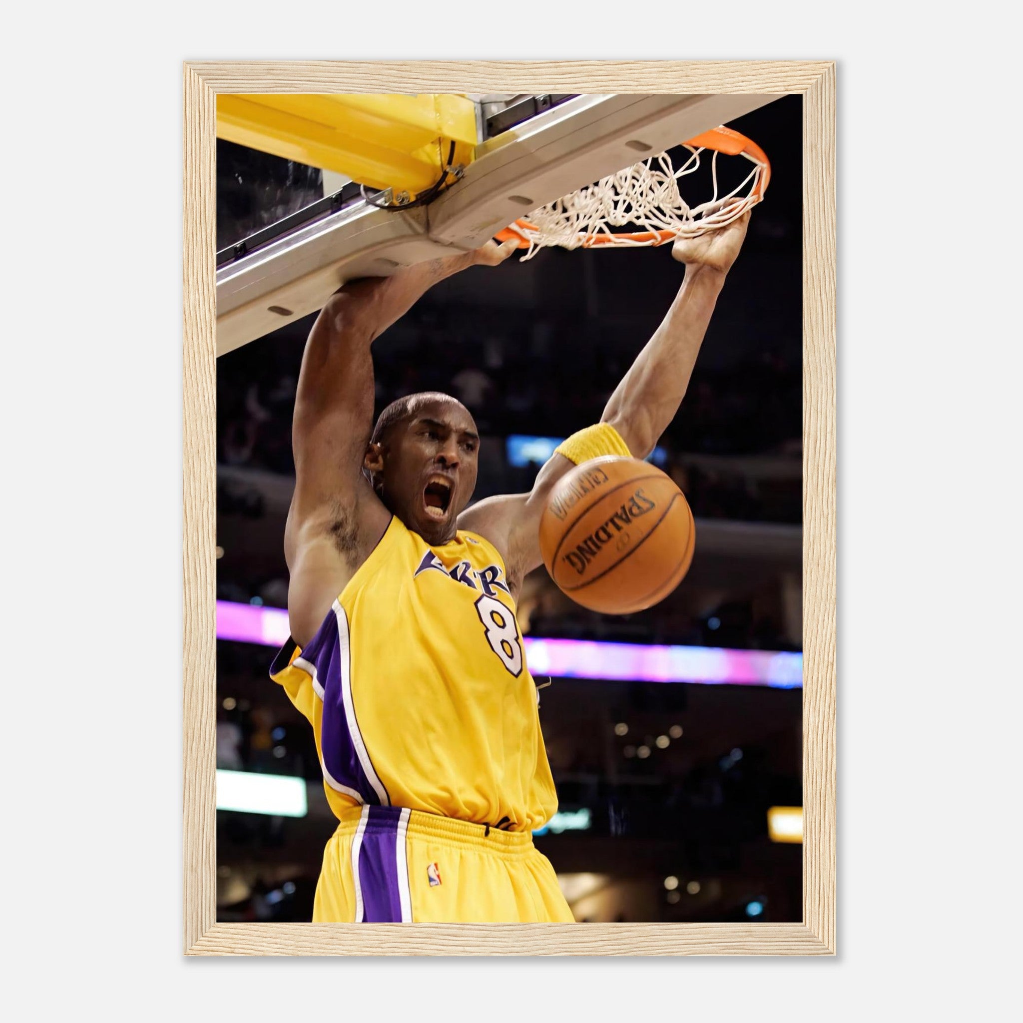 Kobe Bryant performing an iconic slam dunk in Lakers colors, framed print showcasing his athleticism and basketball legend status.