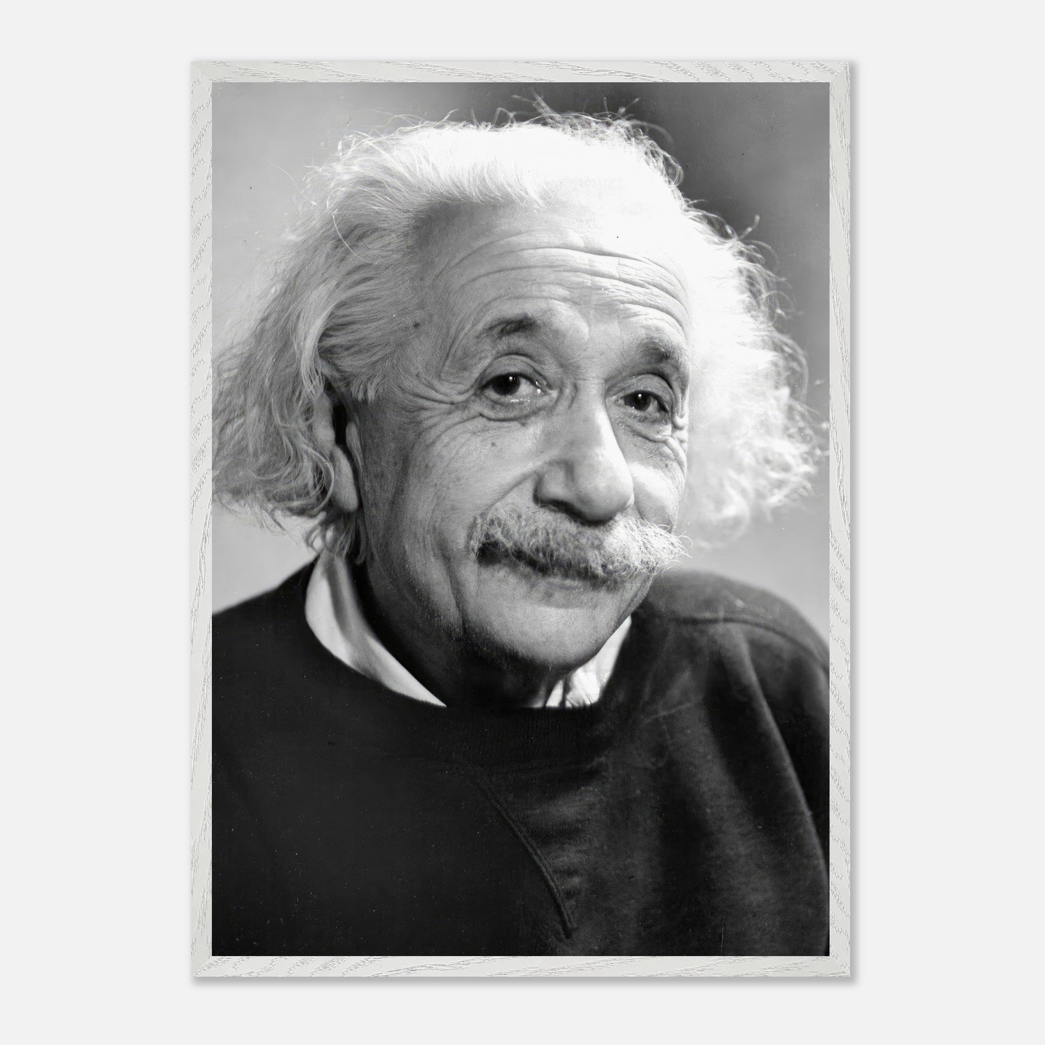 Black-and-white portrait of Albert Einstein, 1946, showcasing his wisdom and iconic hairstyle.