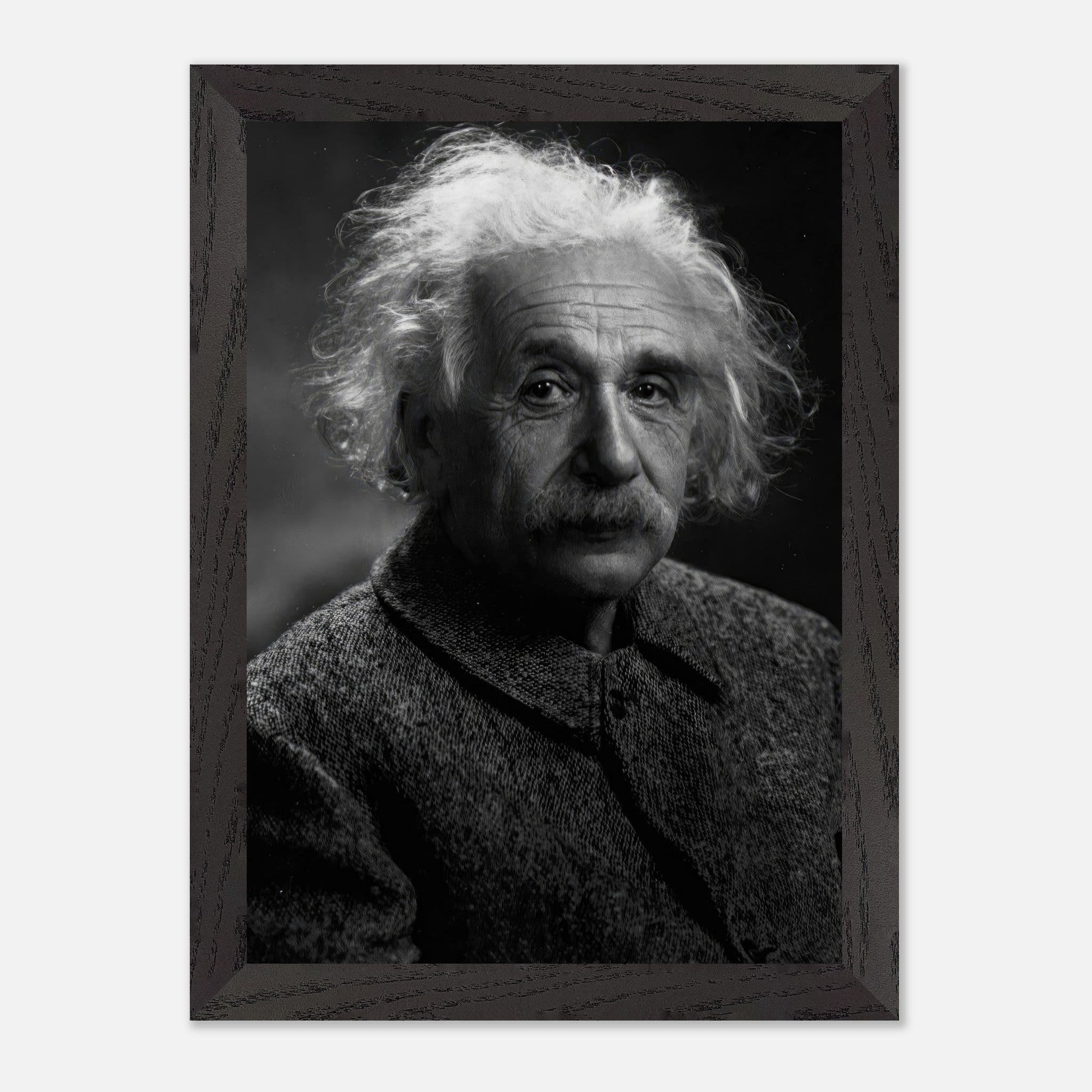 Vintage framed portrait of Albert Einstein in black and white, showcasing his iconic wisdom and intellect.