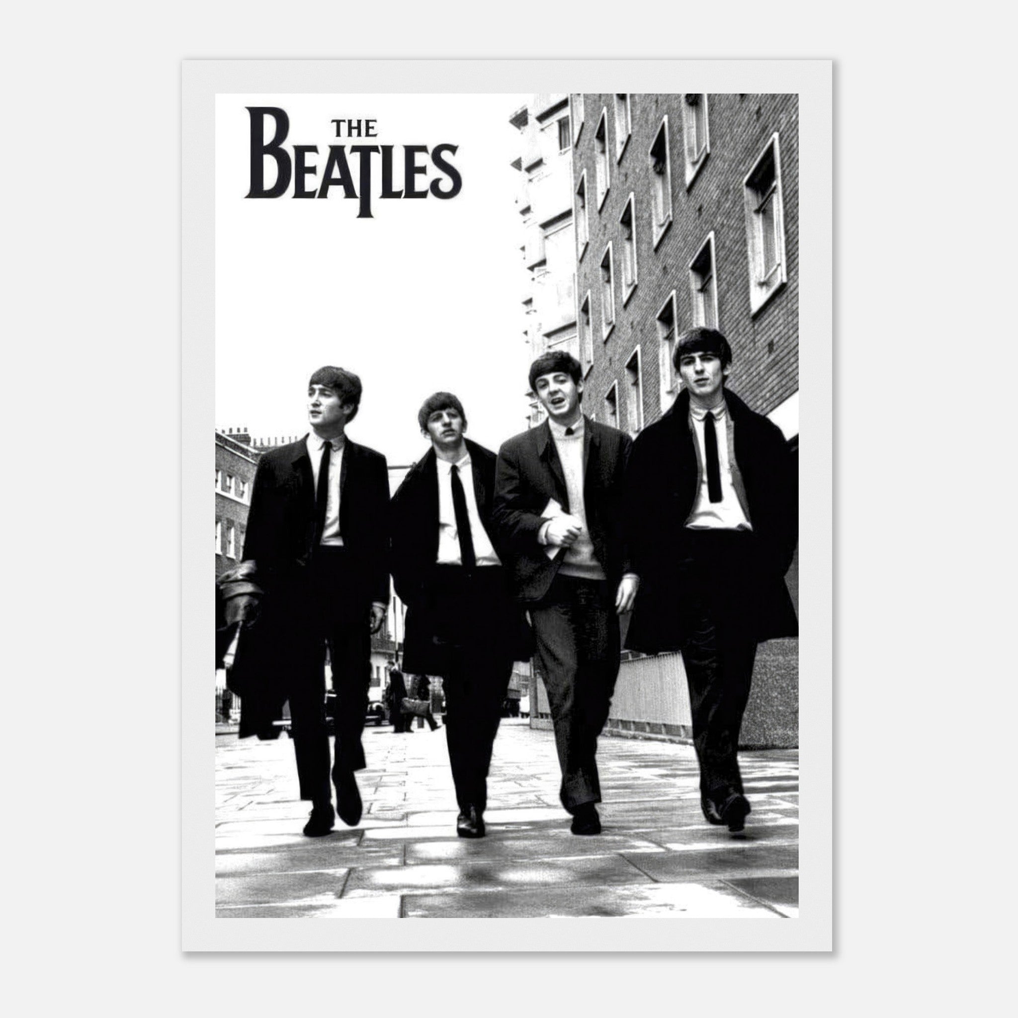 The Beatles Cover Framed Print featuring iconic black and white image of the band walking together.