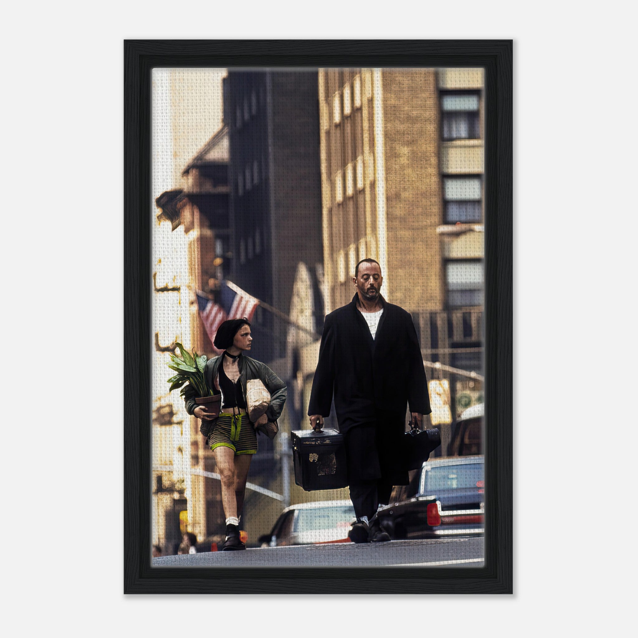 Jean Reno and Natalie Portman walking in a city scene from Leon: The Professional framed canvas print.