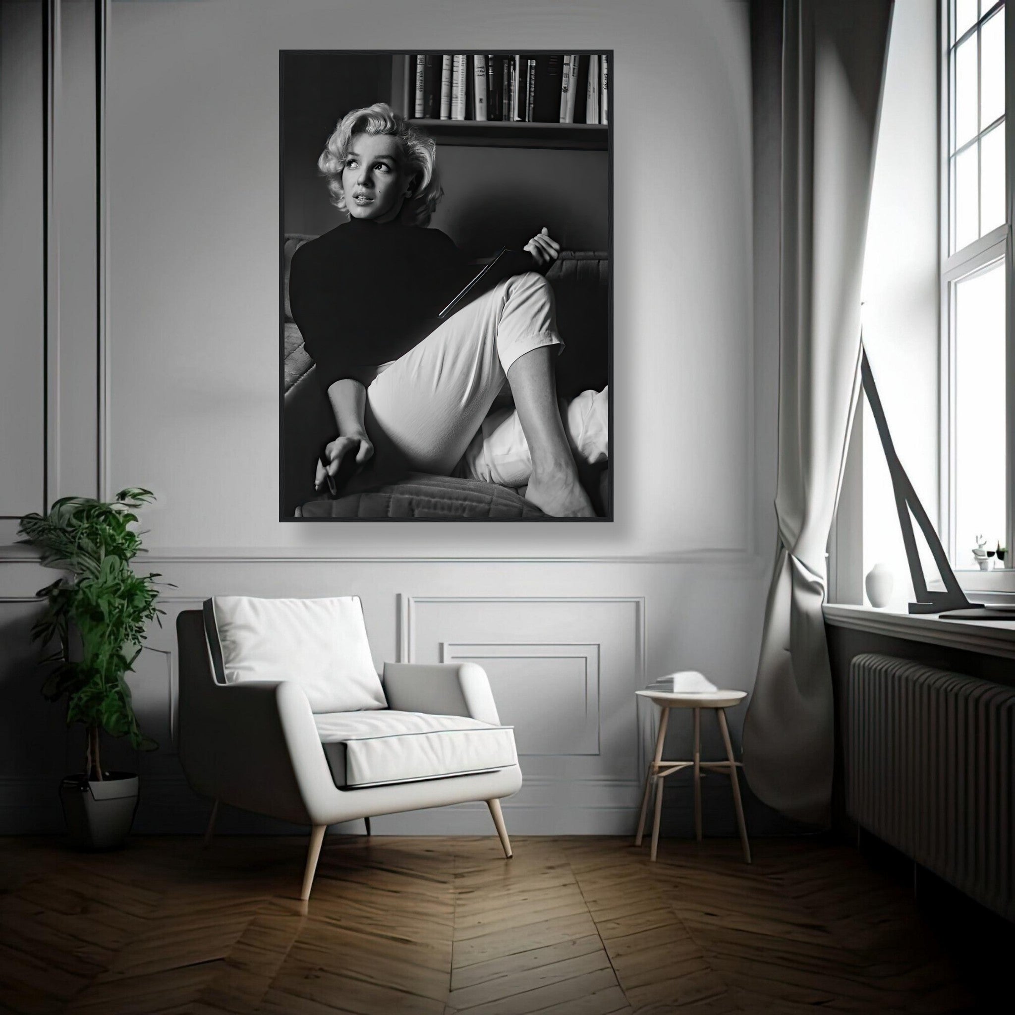 Marilyn Monroe framed print of her reading, adding vintage charm to modern decor in a stylish room.