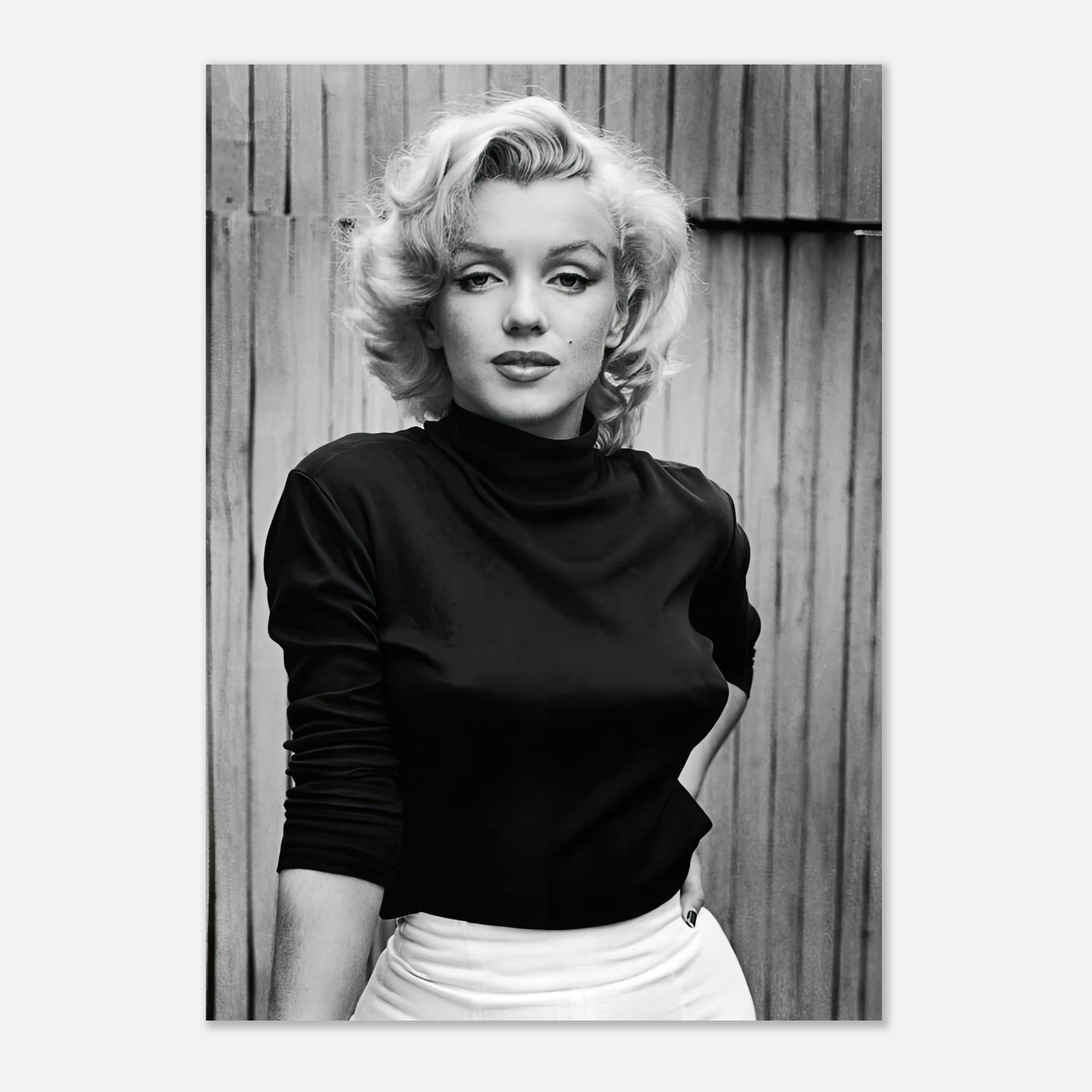 Classic black-and-white portrait of Marilyn Monroe, showcasing her timeless beauty and elegant style.