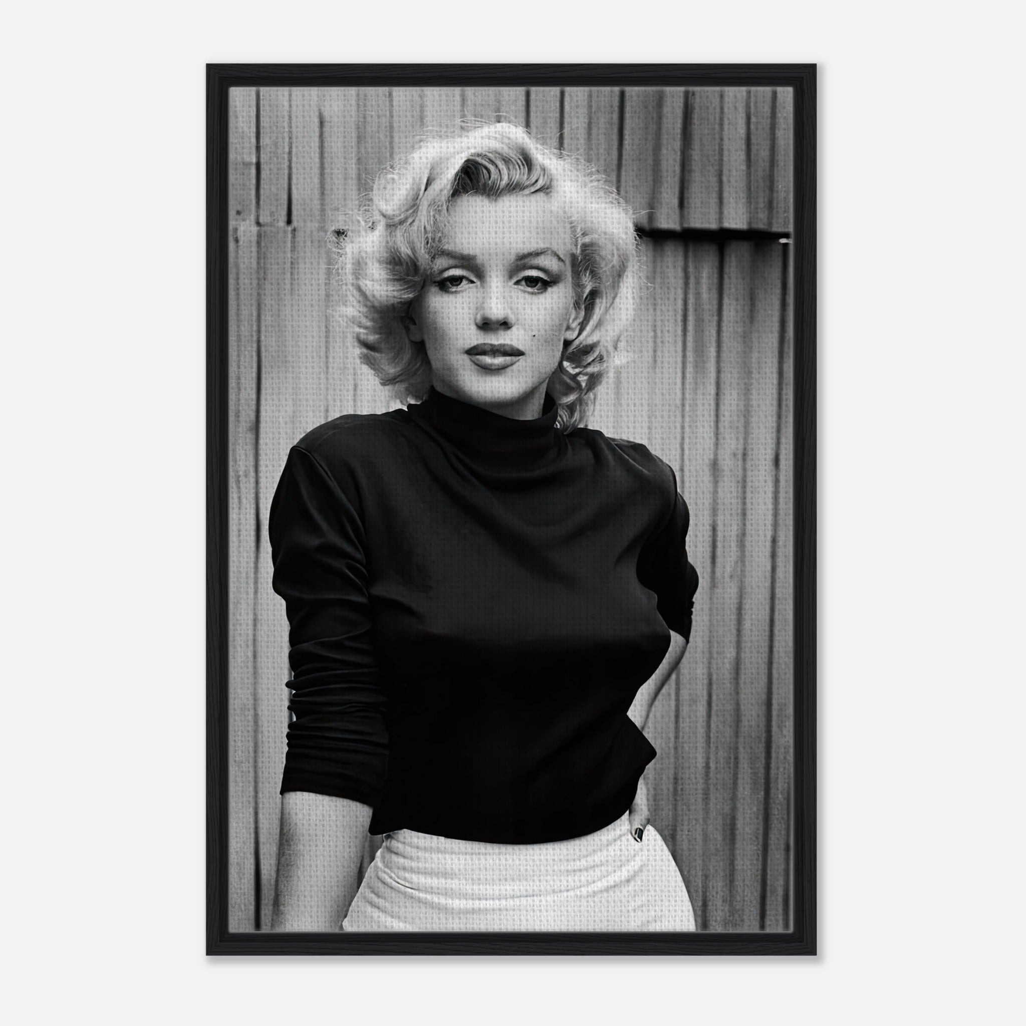 Framed black-and-white portrait of Marilyn Monroe, showcasing her iconic beauty and timeless elegance.
