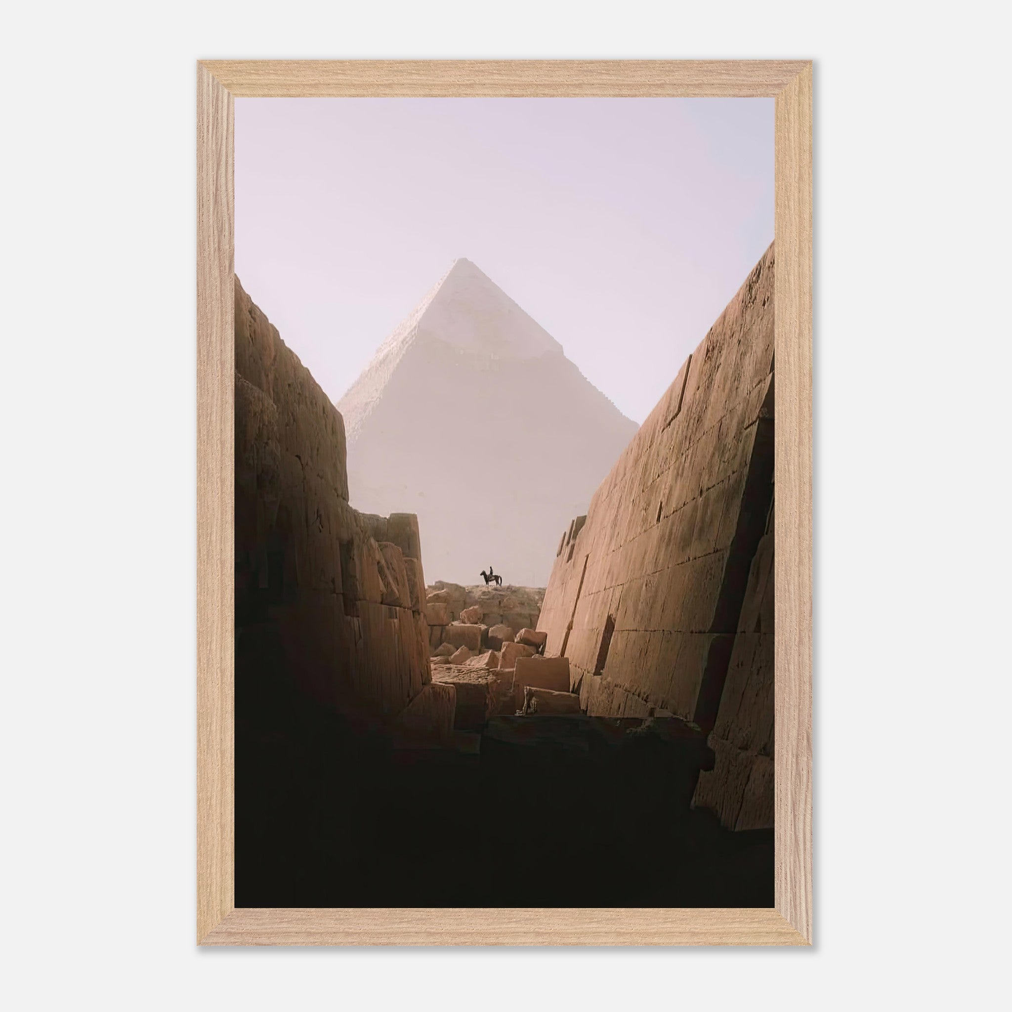 Museum-quality print of a lone rider near the Great Pyramid of Giza, capturing the essence of Egypt's historic landscape.