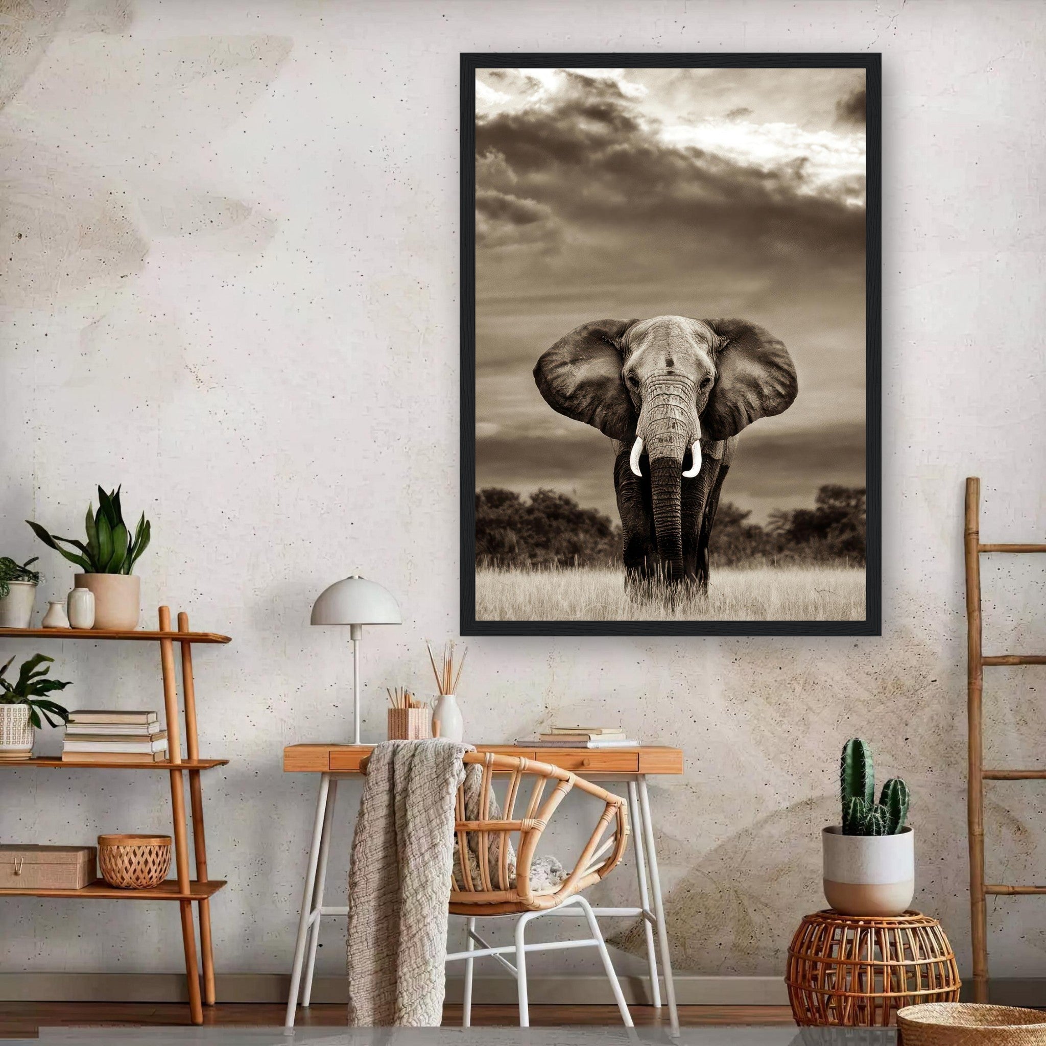 Framed black-and-white elephant portrait photography against a dramatic sky, perfect for home decor.