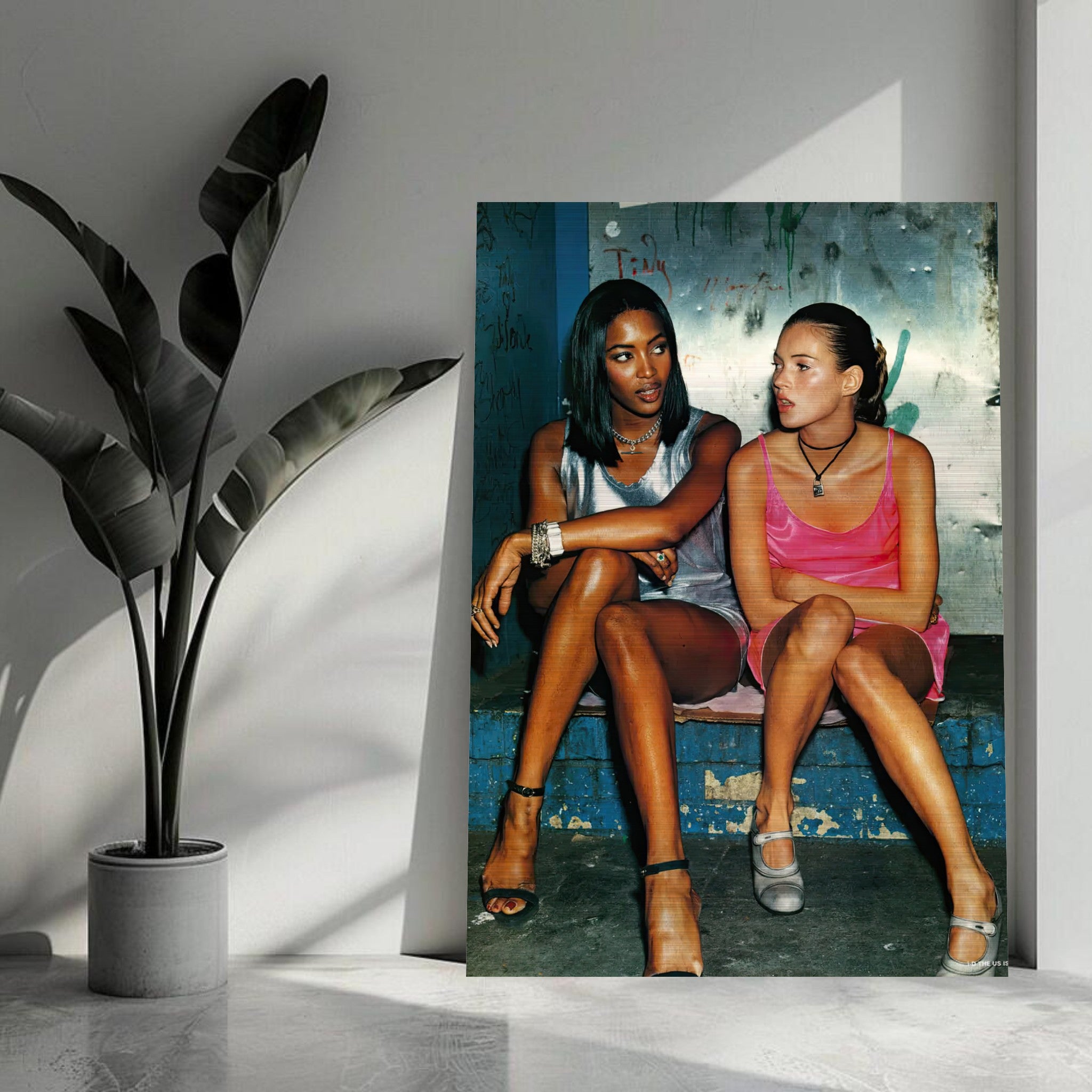 Naomi Campbell and Kate Moss in 90s fashion, captured in brushed metal print, showcasing street style elegance.