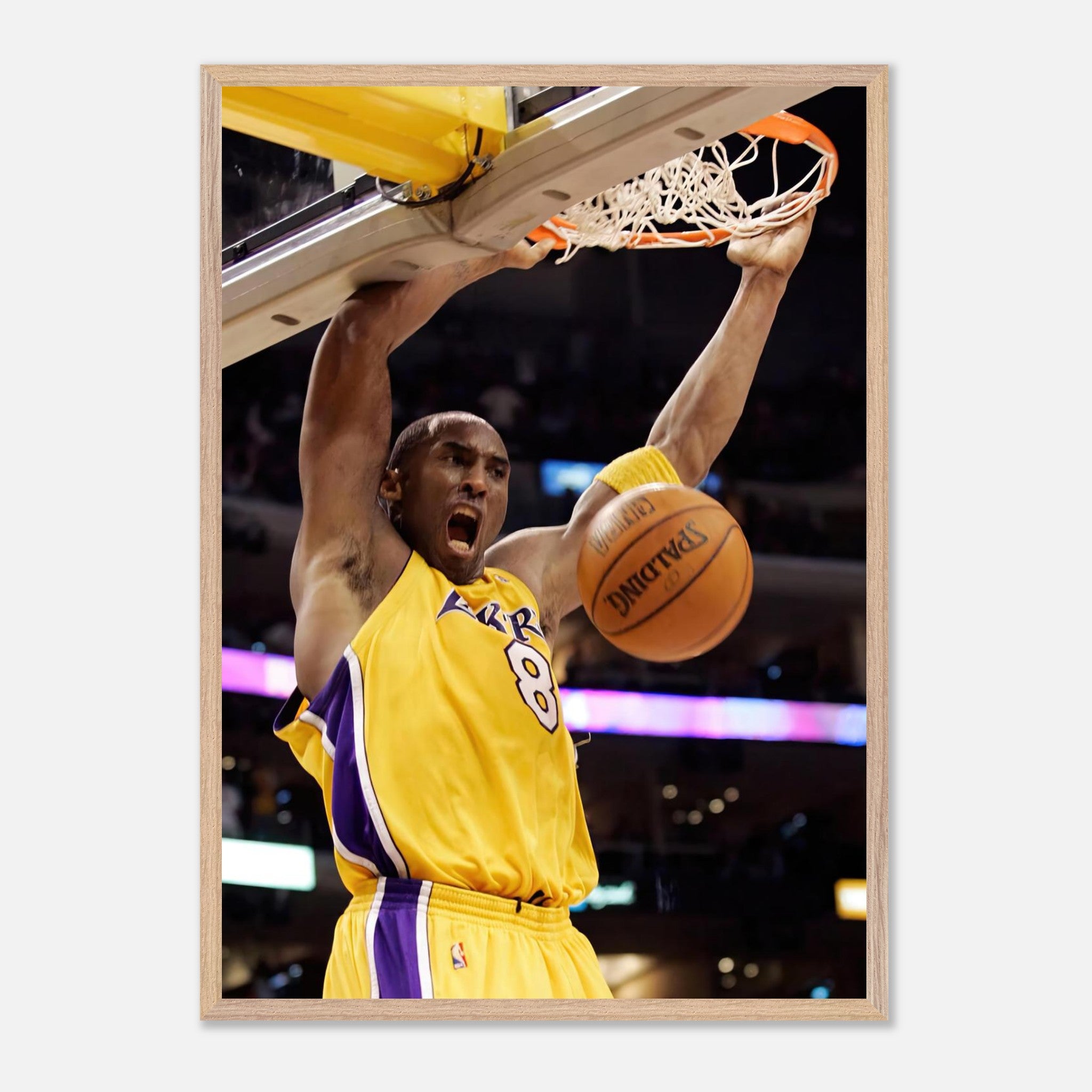 Kobe Bryant's iconic slam dunk in vintage framed print, showcasing athleticism and passion for basketball.