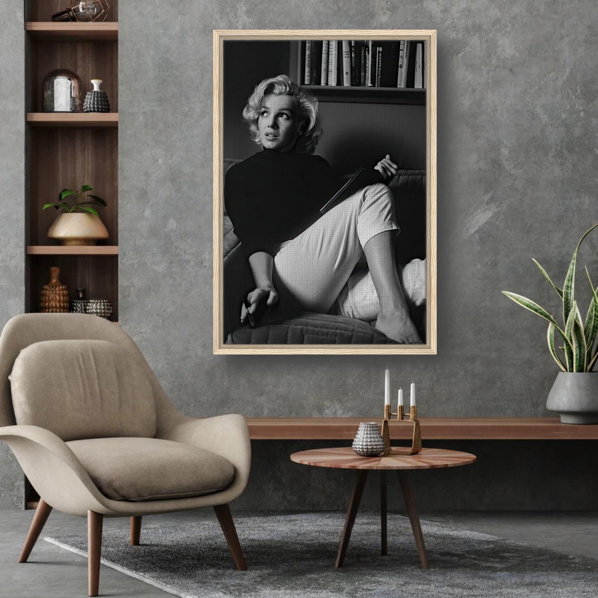 Framed canvas print of Marilyn Monroe reading a book in a stylish living room, exuding elegance and charm.