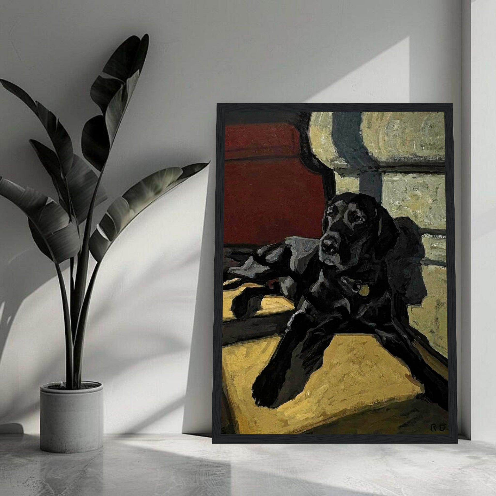 Framed painting of a black Labrador lounging in a cozy setting, showcasing rich earthy tones and expressive brushstrokes.
