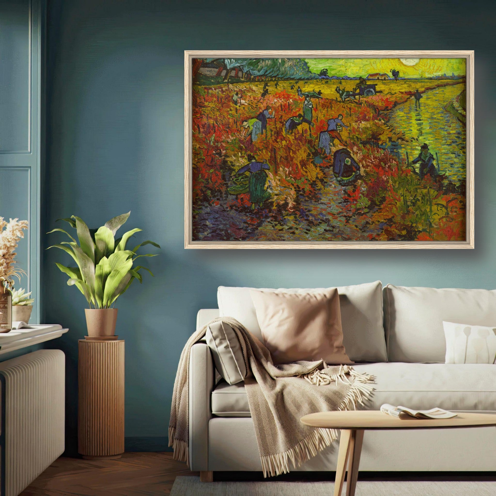 The Red Vineyard by Van Gogh framed canvas print displayed in a modern living room setting.