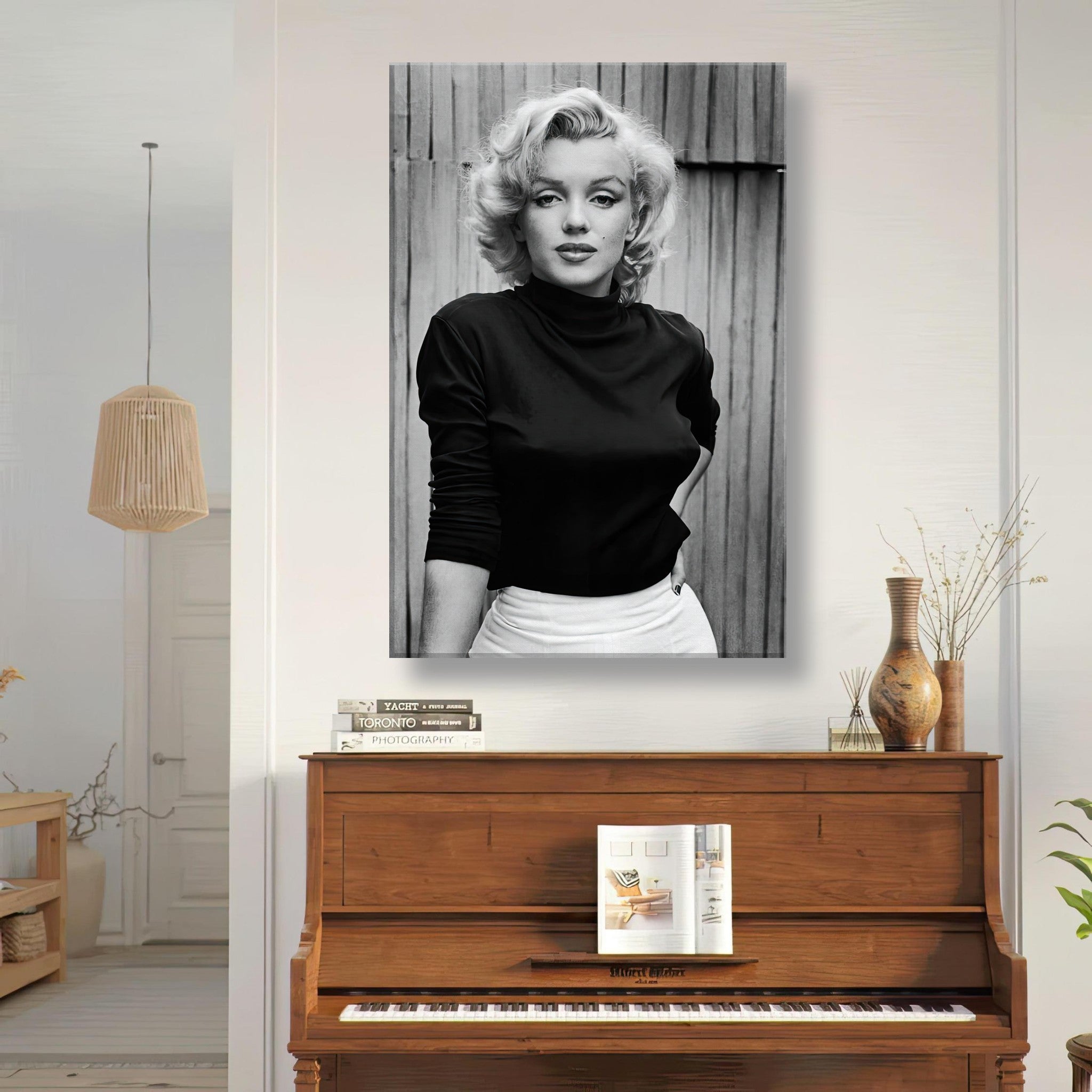 Marilyn Monroe portrait canvas art in black and white, displayed above a wooden piano in a stylish interior.