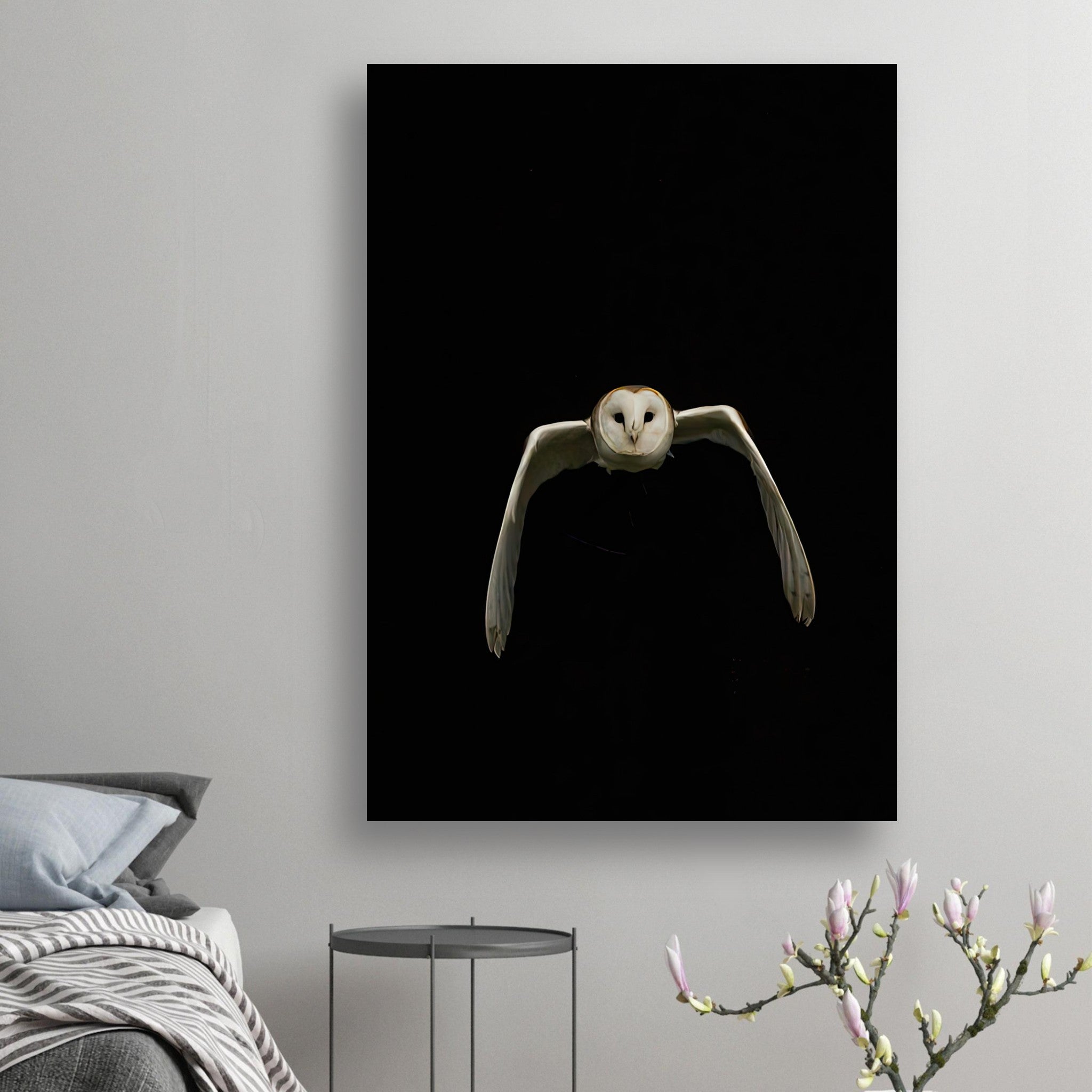 Minimalist owl poster featuring a barn owl in flight against a black background, perfect for home decor.