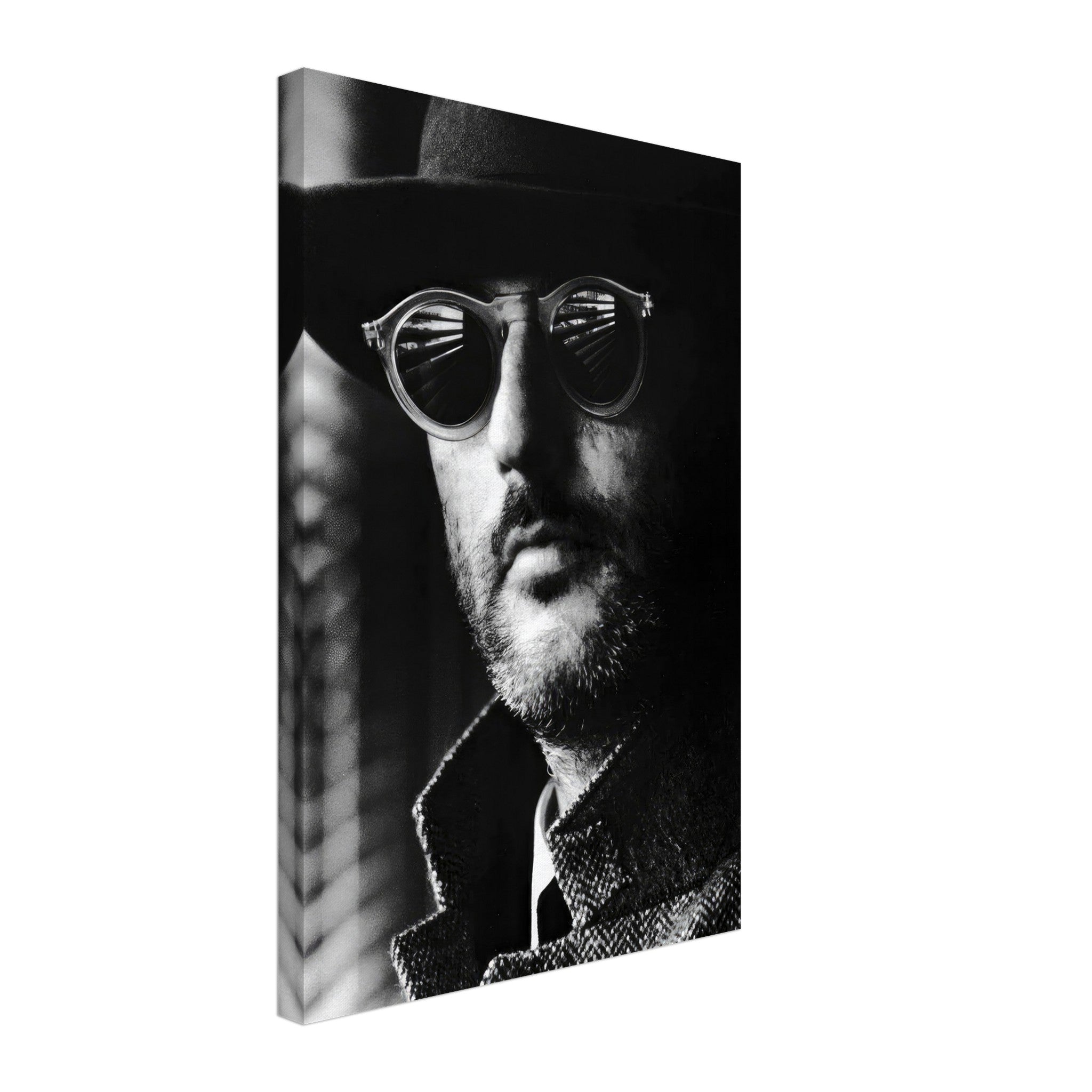 Black-and-white canvas of a man in sunglasses and hat, showcasing Jean Reno's striking portrait.