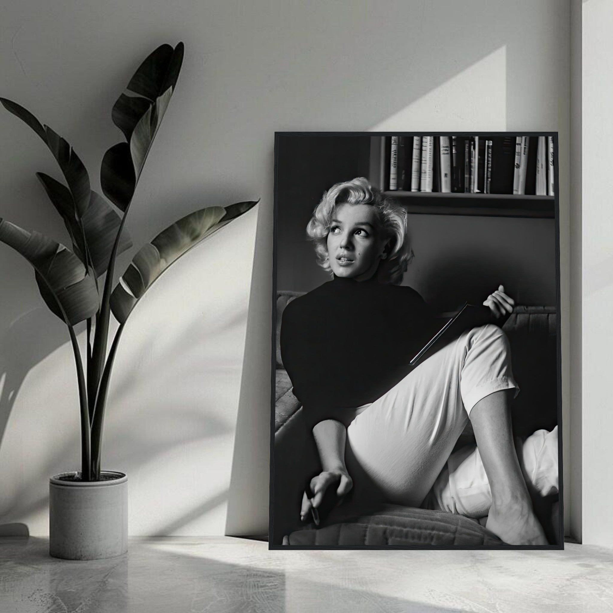 Marilyn Monroe reading book framed print, black-and-white artwork, vintage elegance for home decor.