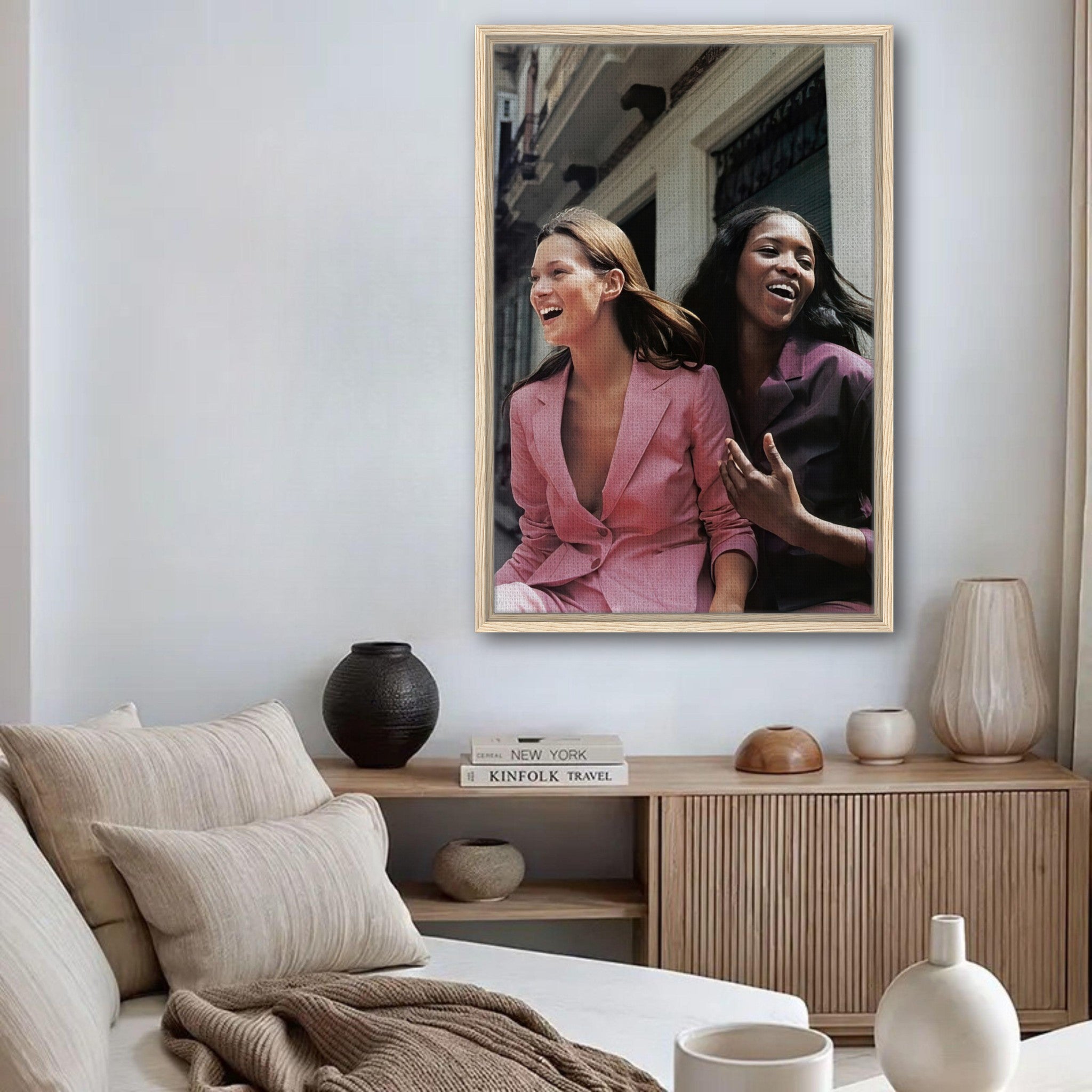 Naomi Campbell and Kate Moss smiling together in a framed canvas print, adding elegance to modern decor.