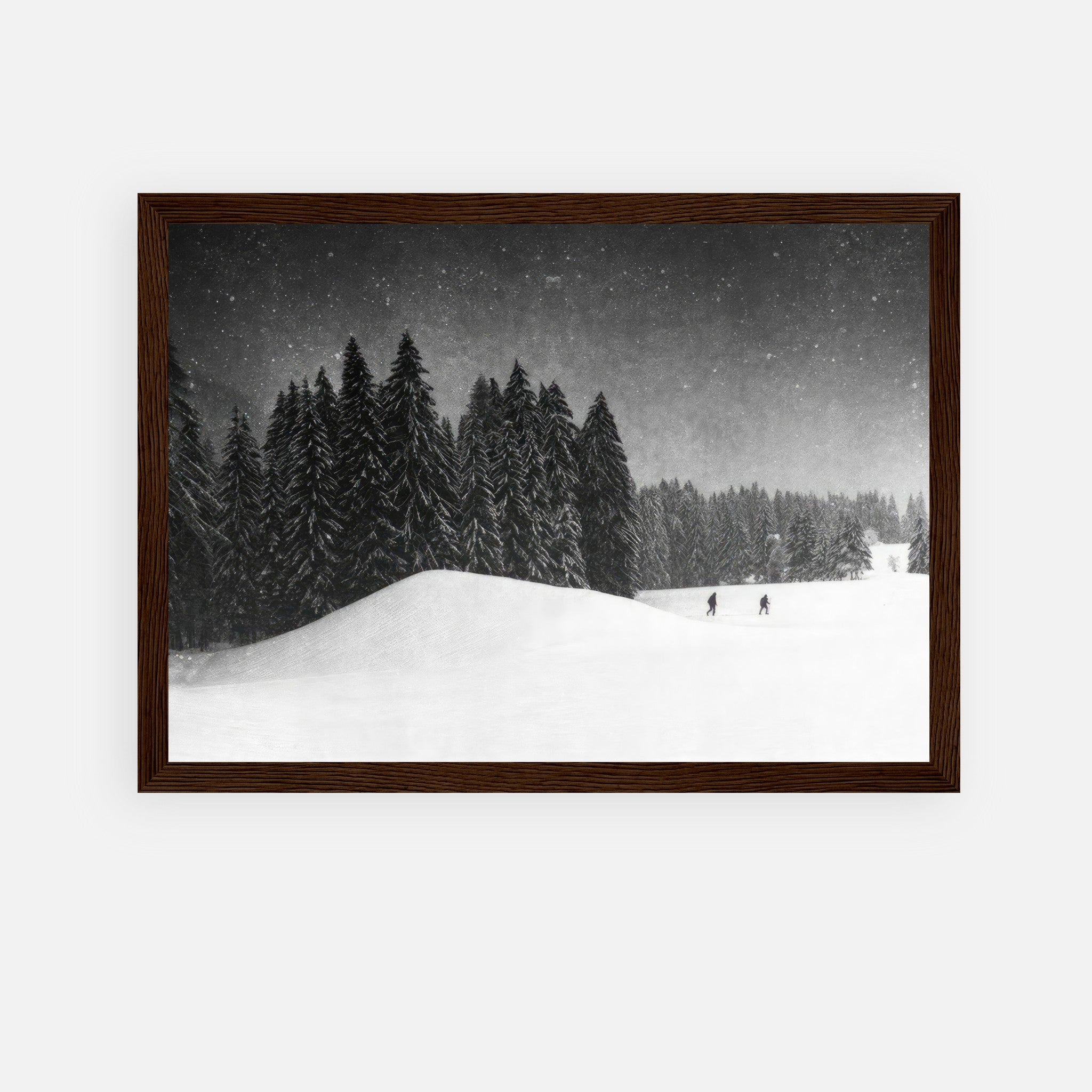 Framed print of a snowy forest landscape with evergreens, capturing the serene beauty of winter.