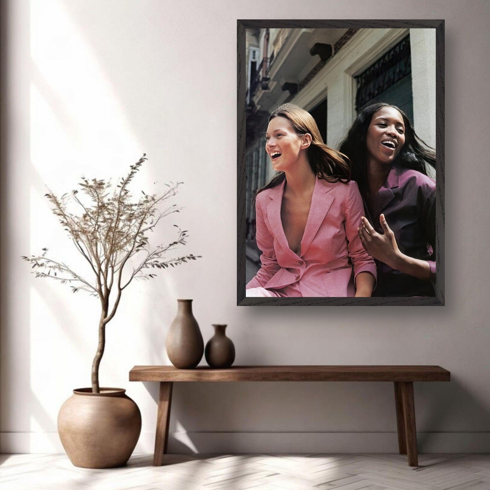 Naomi Campbell and Kate Moss fine art print in stylish room, capturing fashion’s golden era and iconic friendship.