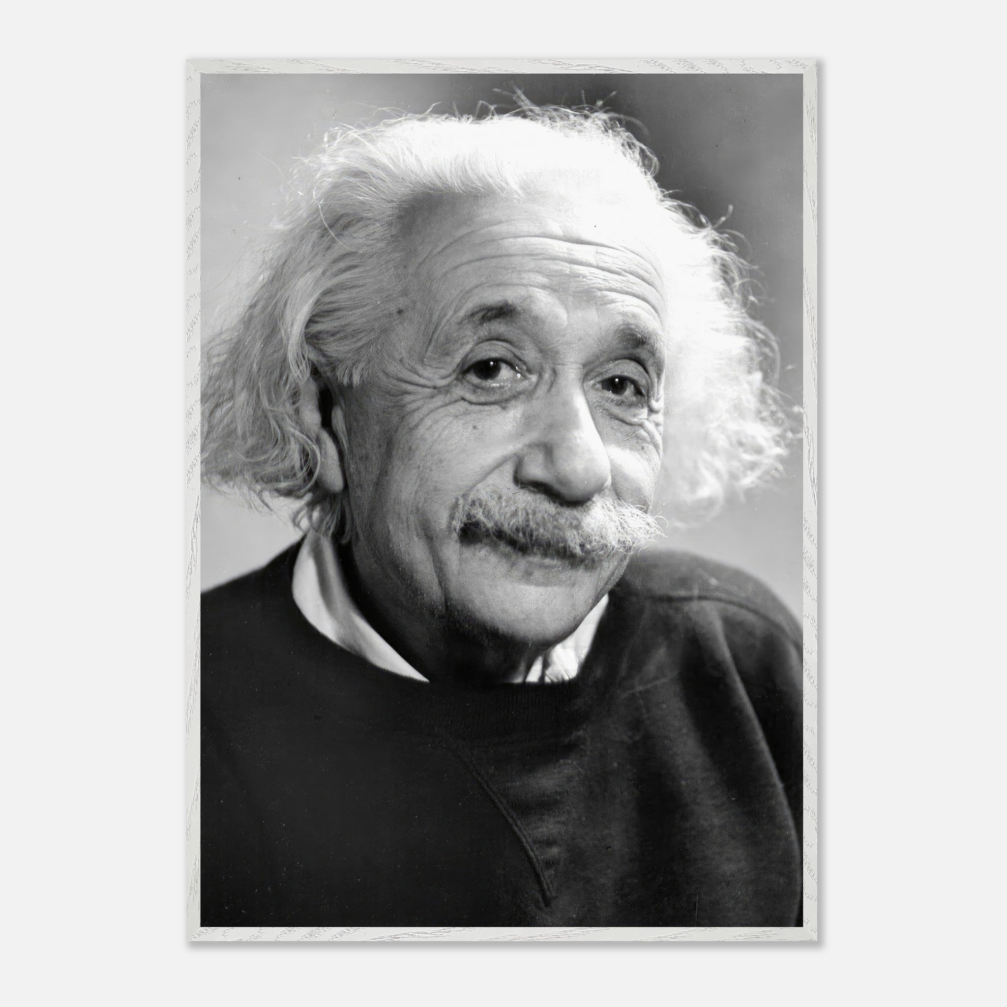 Black-and-white portrait of Albert Einstein, captured in 1946, showcasing his wisdom and distinctive hairstyle.