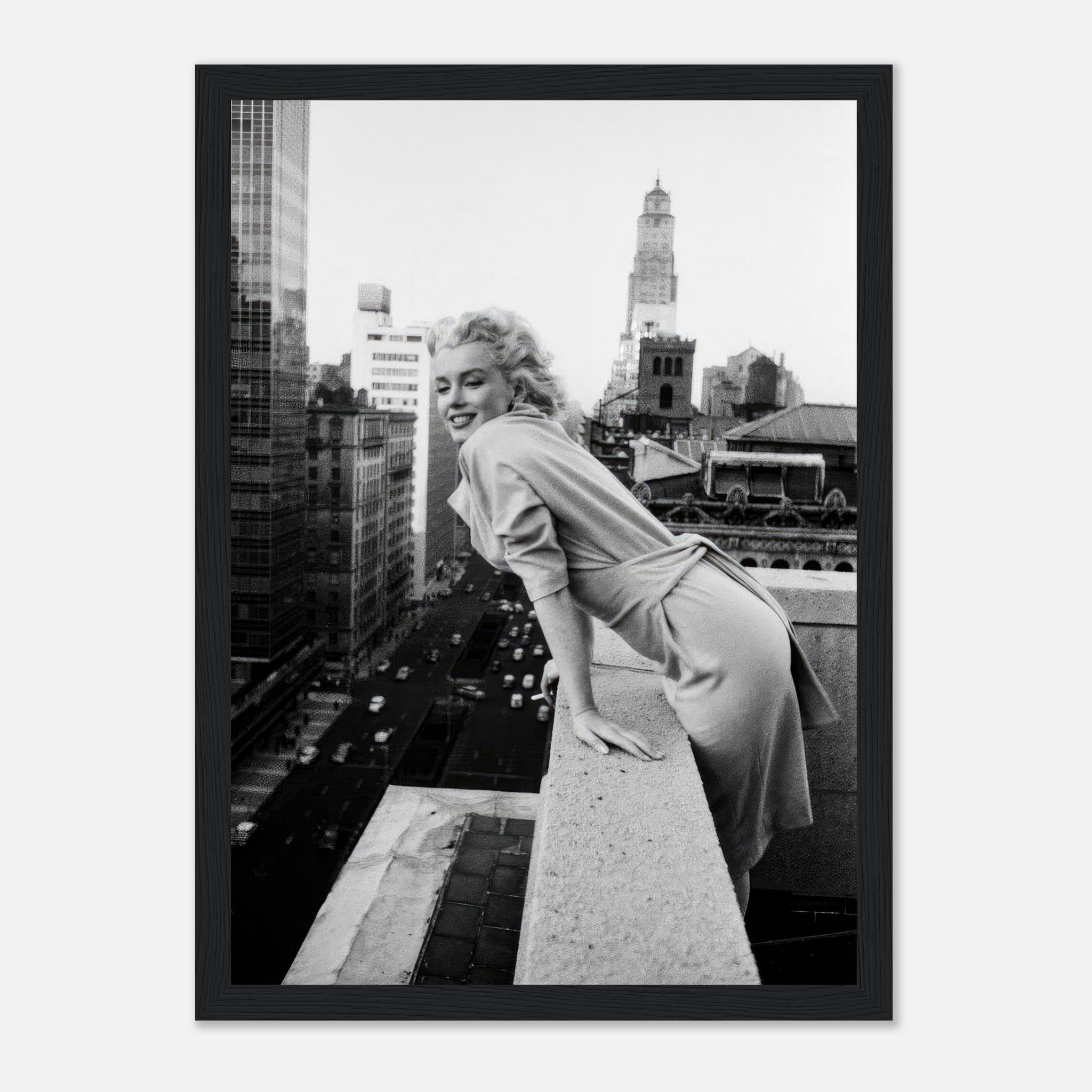 Marilyn Monroe framed print on New York rooftops, smiling with urban skyline in black-and-white.