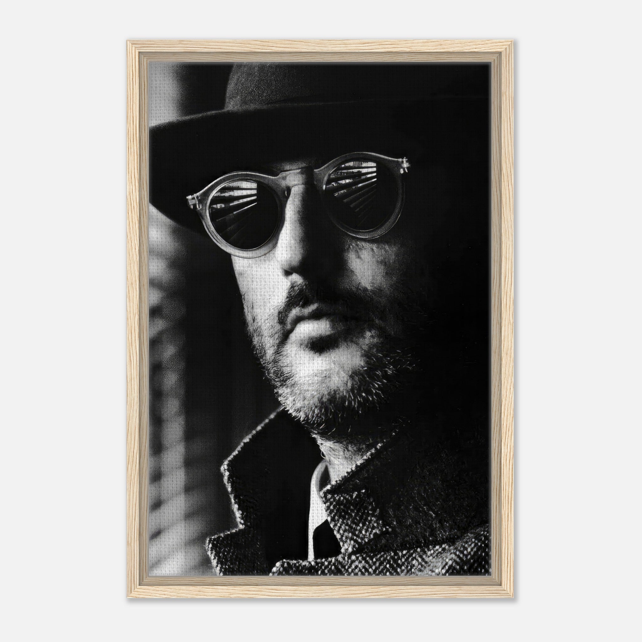 Black-and-white framed canvas print of a man in sunglasses, exuding cinematic sophistication.