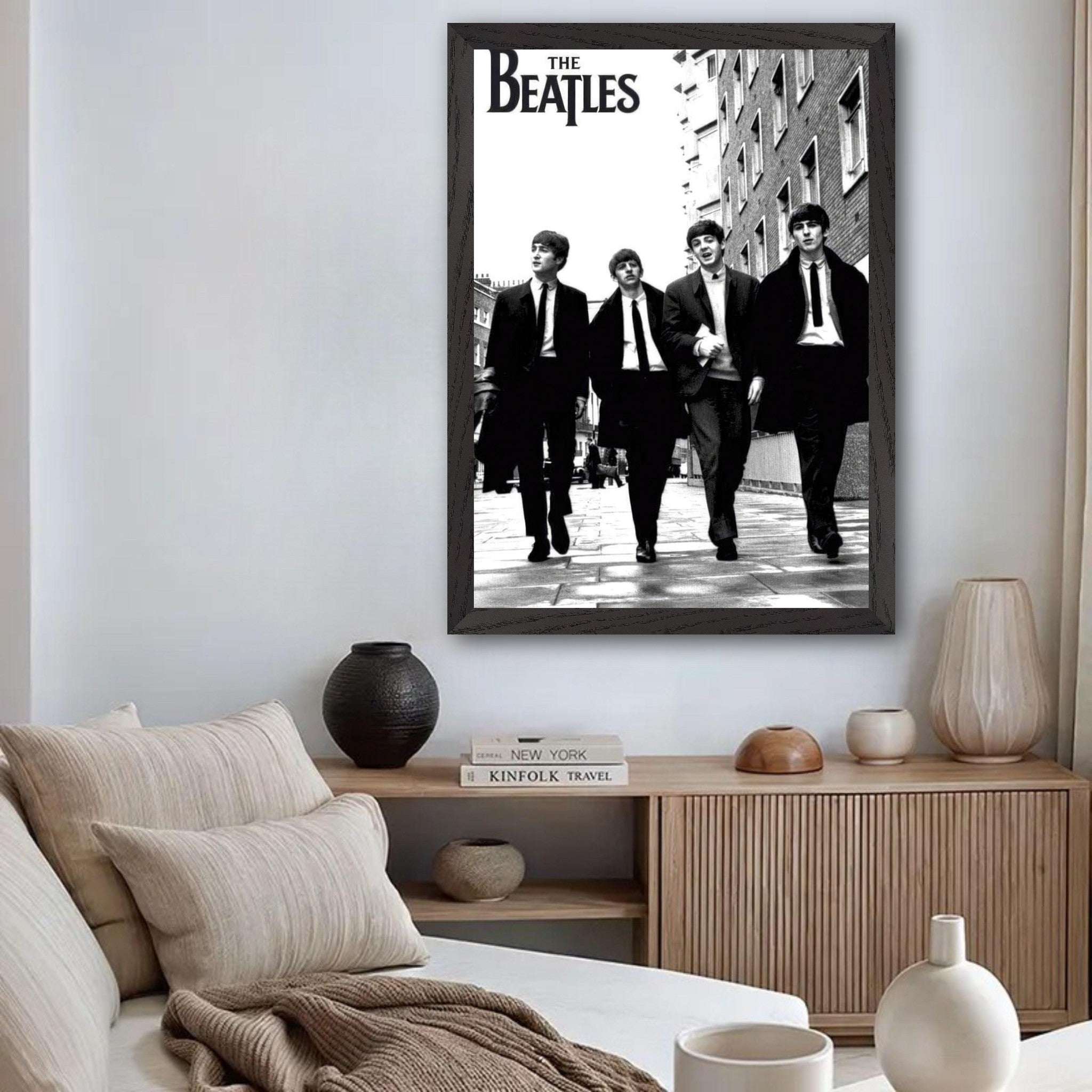 Vintage framed print of The Beatles walking down the street, perfect for music lovers and home decor enthusiasts.