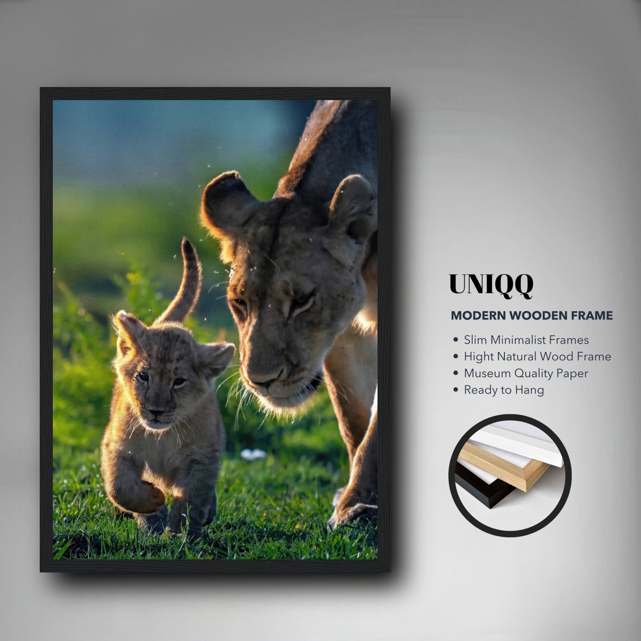 Protective lion mother with cub framed print, showcasing wildlife in a modern wooden frame, ideal for home decor.
