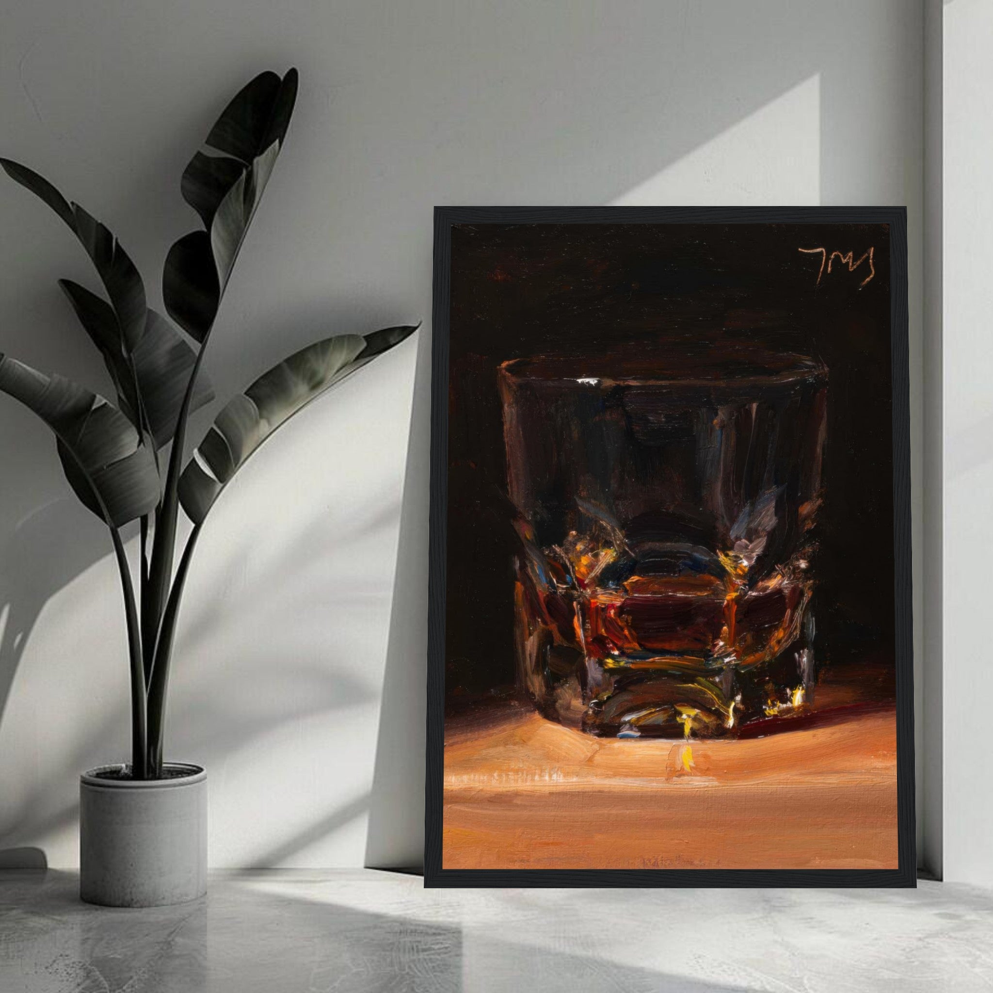 Whiskey framed print featuring a glass filled with amber liquor, adding a touch of elegance to any decor.