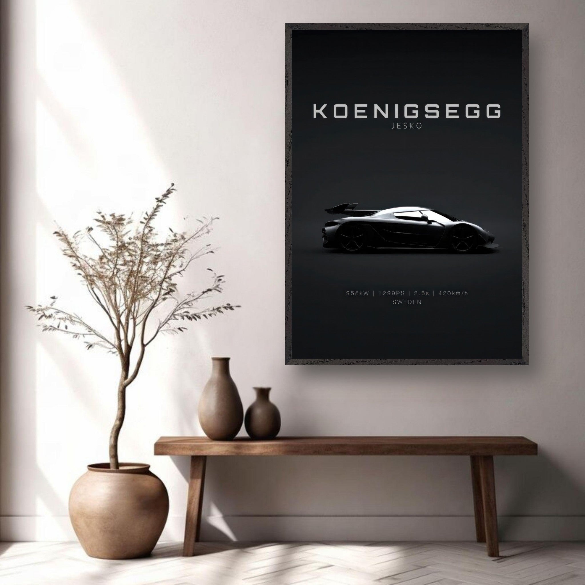 Framed art of Koenigsegg Jesko hanging on a wall with decorative plants and vases, showcasing sleek automotive design.
