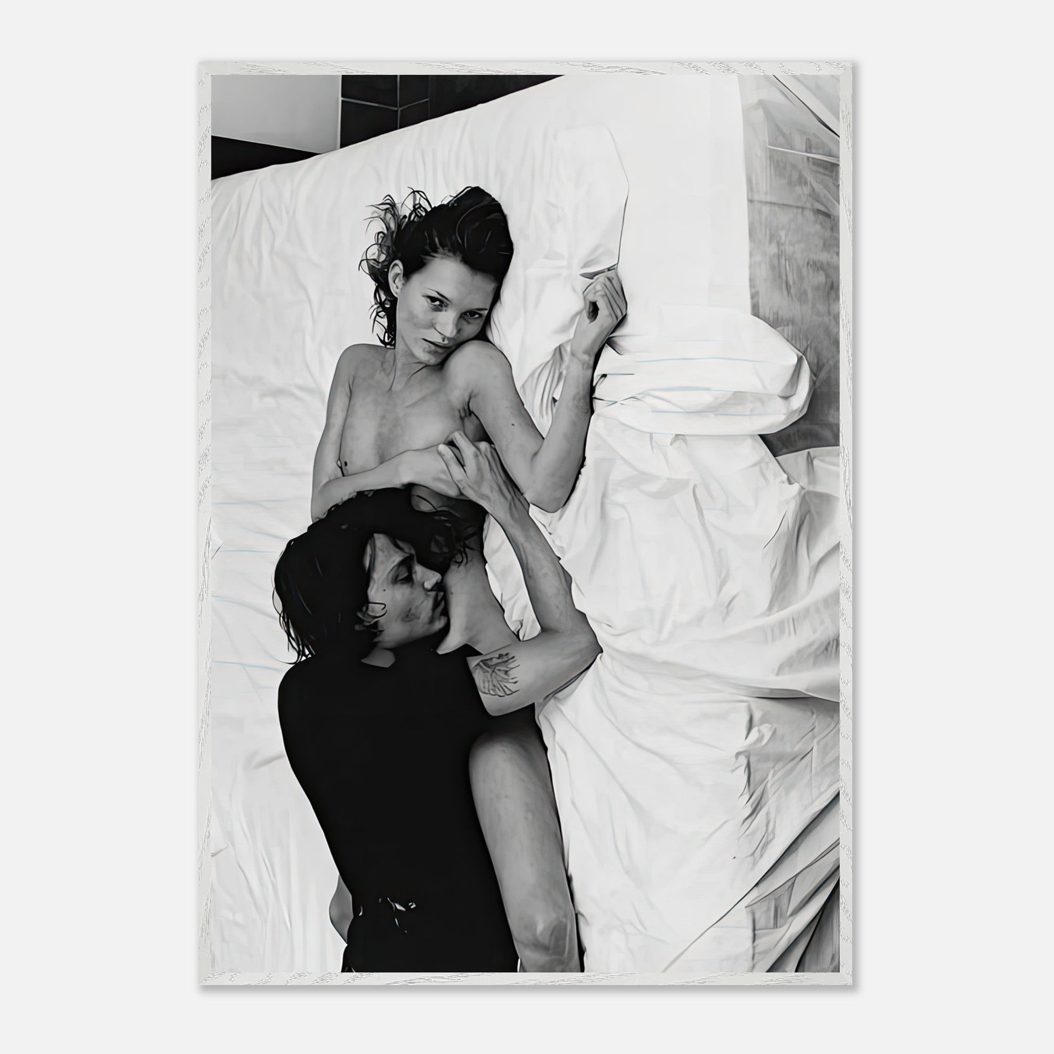 Black and white fine art print of Kate Moss and Johnny Depp in an intimate pose on a bed, capturing 1994's pop culture essence.