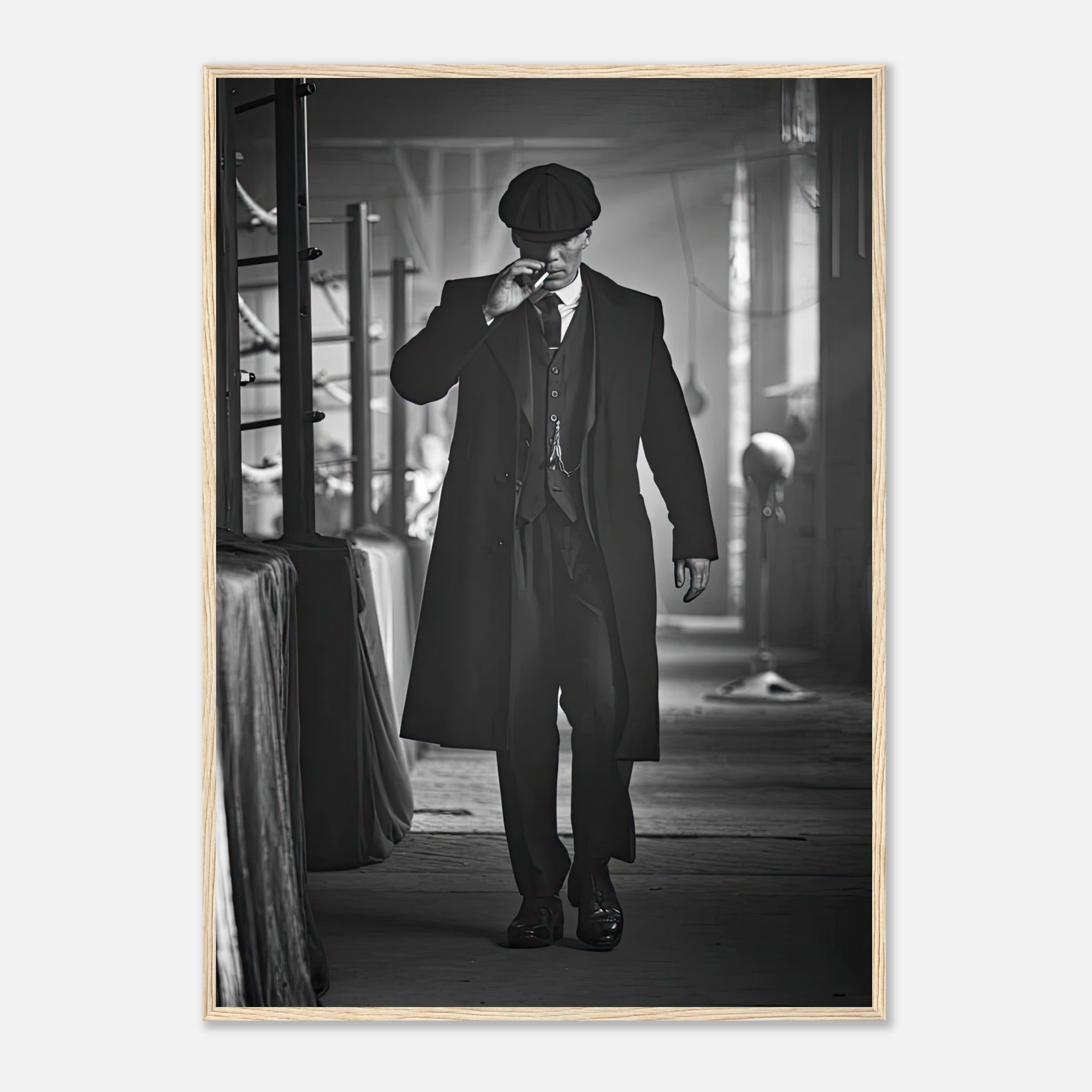 Tommy Shelby from Peaky Blinders framed print, showcasing his classic style in a black-and-white setting.