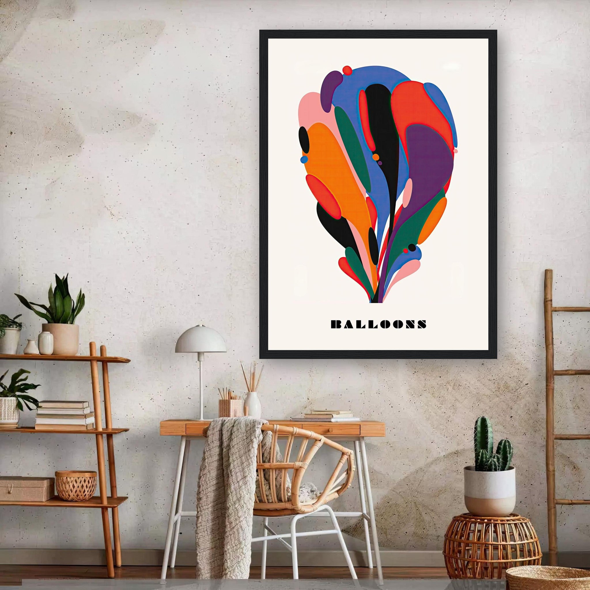 Framed print of colorful abstract balloon art, showcasing vibrant shapes on a neutral wall in a cozy room.