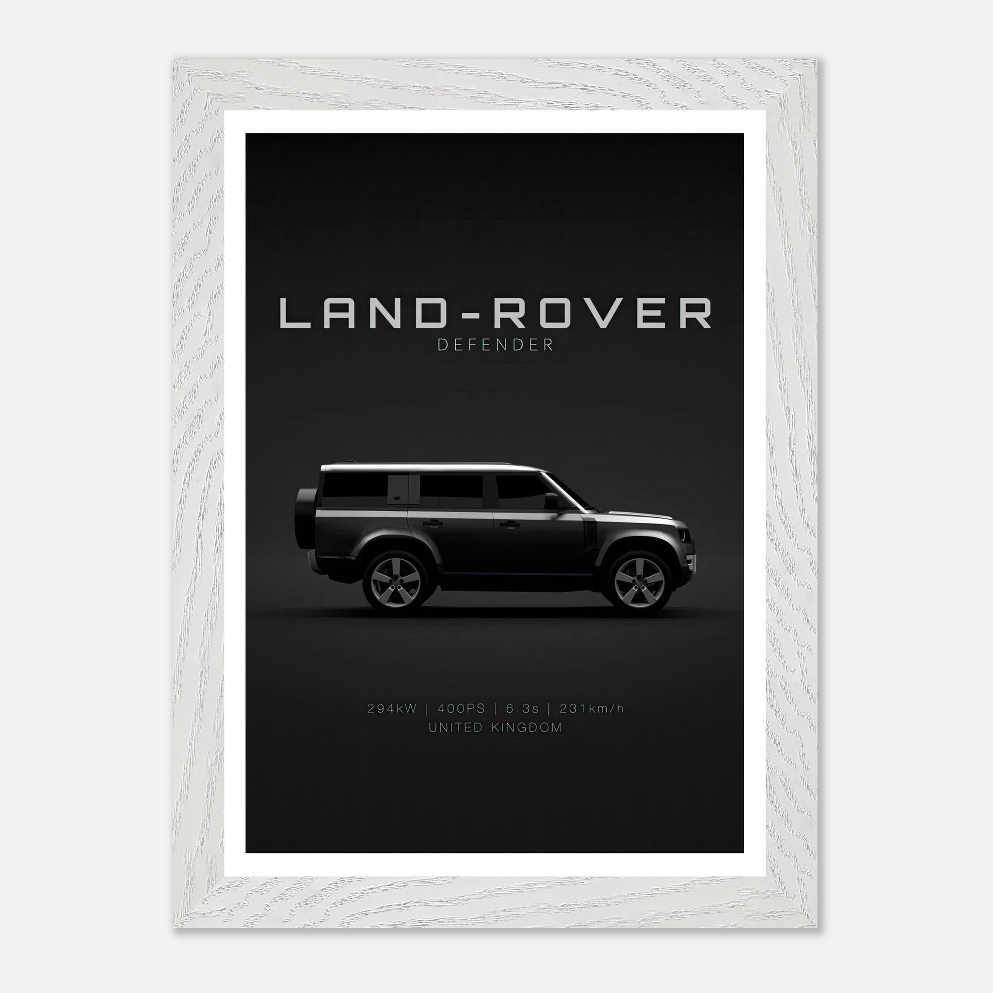 Land Rover Defender vintage framed art showcasing a sleek silhouette on a dramatic black background.