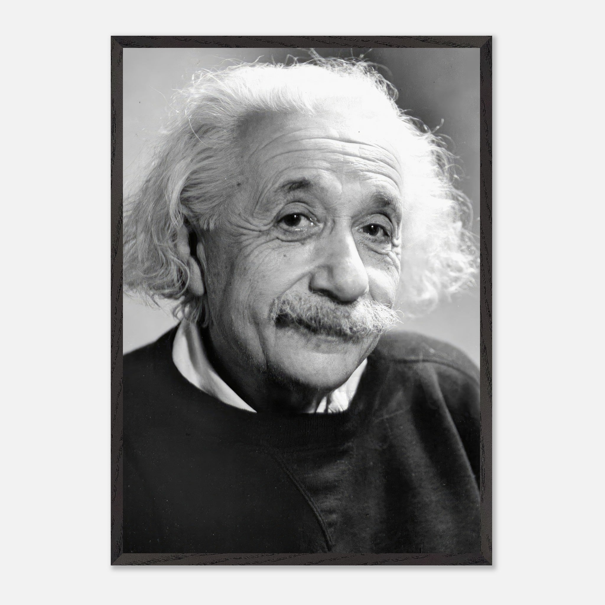 Vintage framed print of Albert Einstein, captured in 1946, showcasing warmth and contemplation.