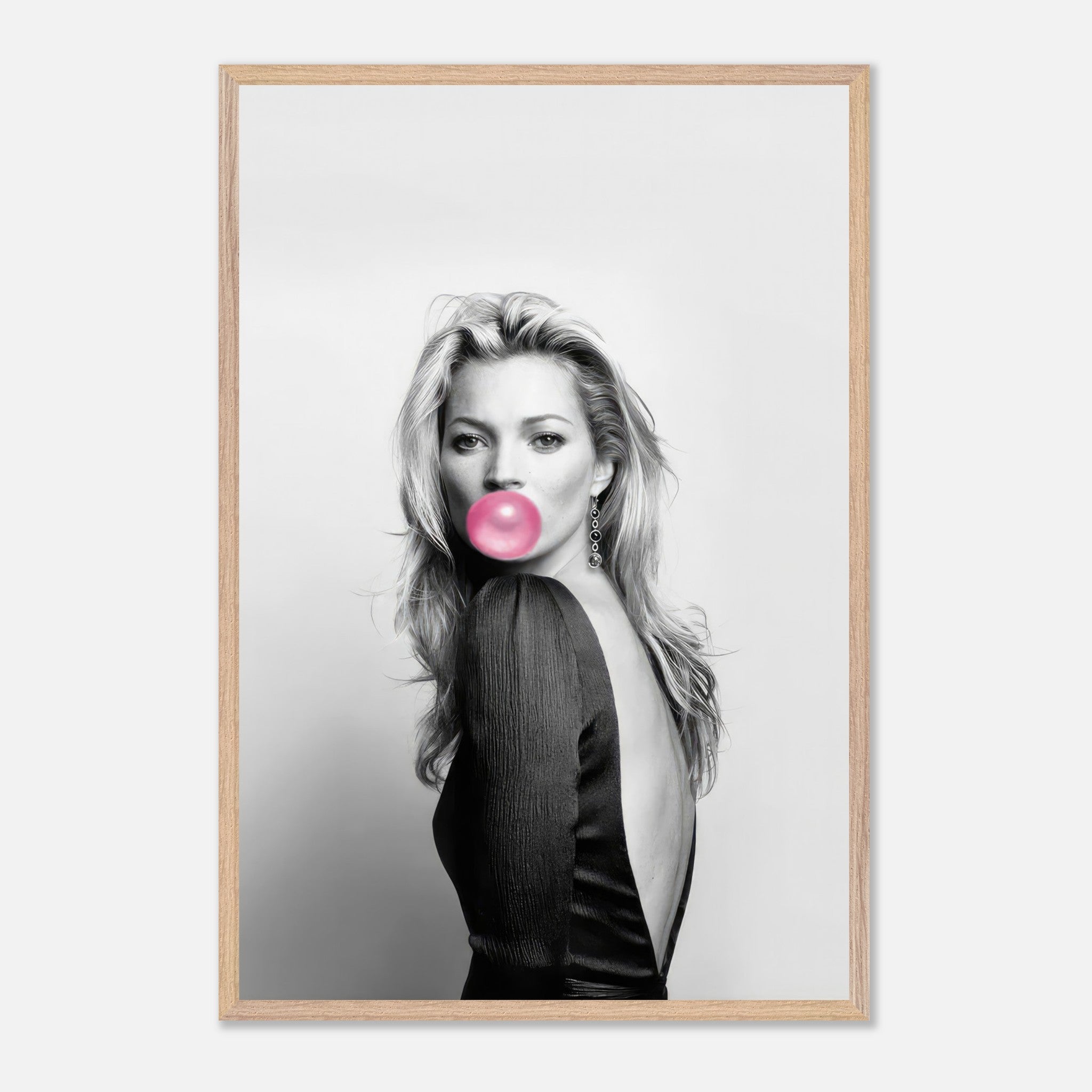 Kate Moss vintage print with pink bubble gum, framed in a stylish Wood frame, adding elegance to home decor.