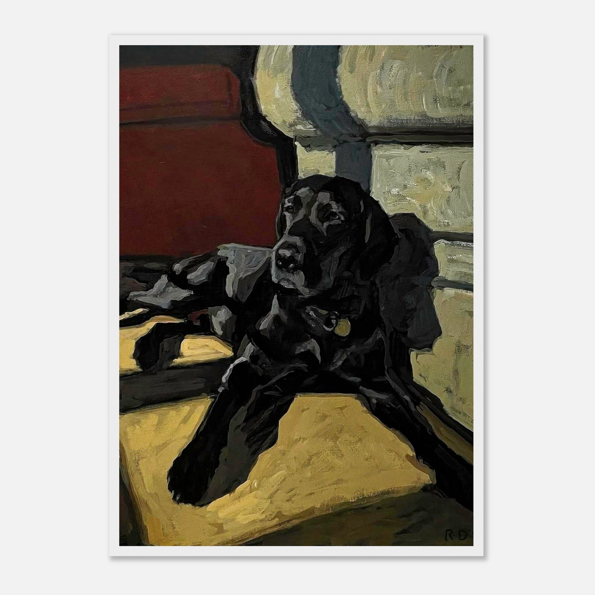 Framed print of a black Labrador lounging in a cozy setting, showcasing warmth and companionship.