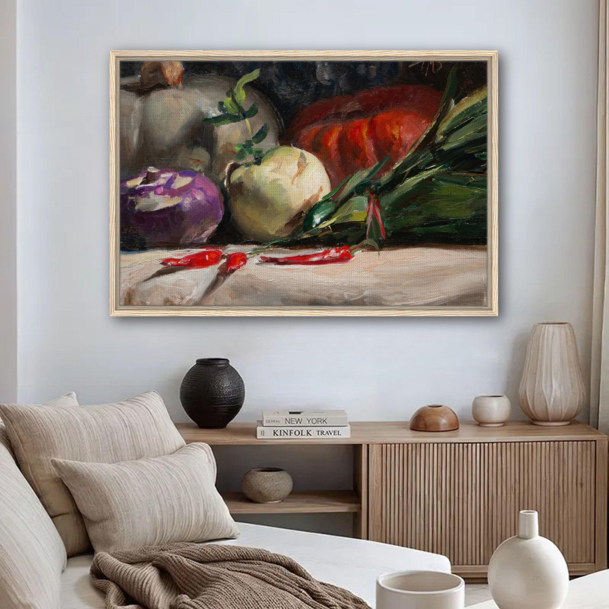 Framed canvas print of kohlrabi, pumpkins, and chilis enhancing a cozy kitchen decor.