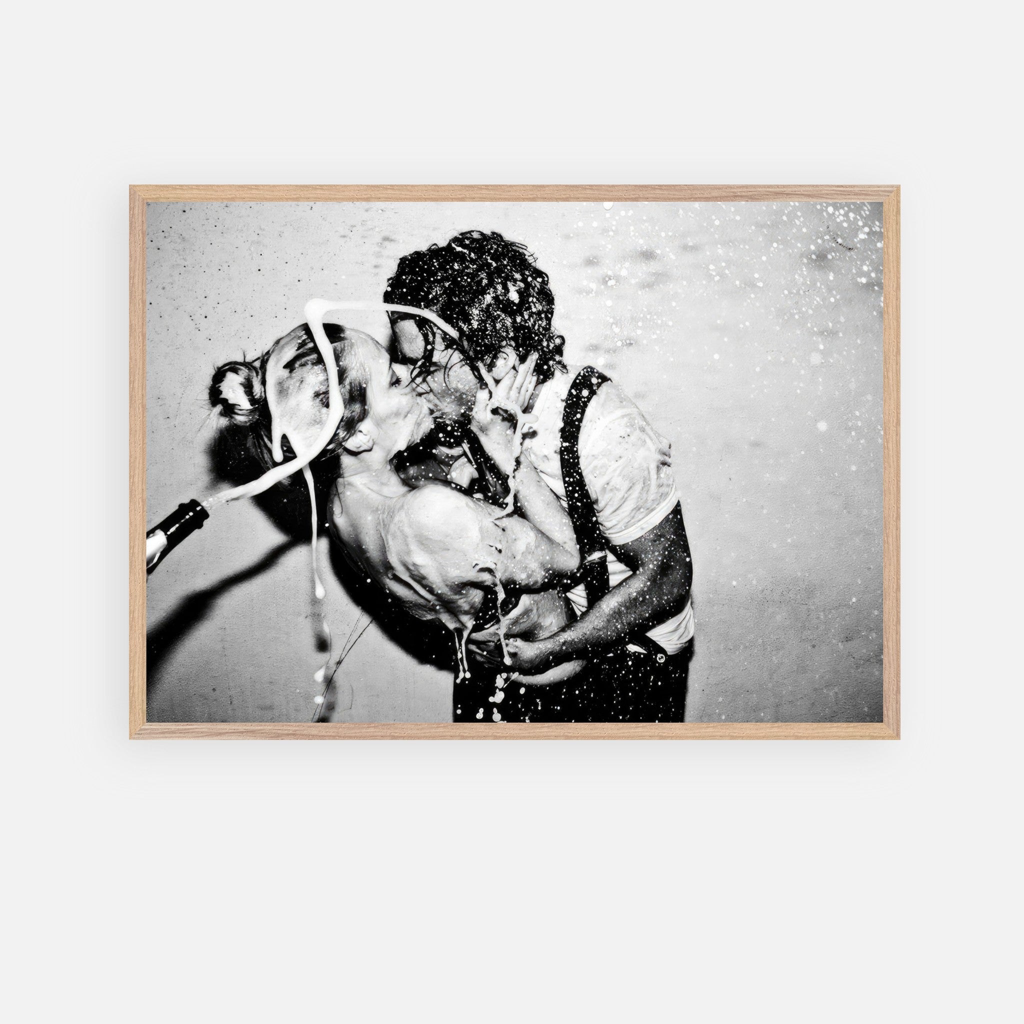The Champagne Kiss fine art print of a passionate kiss between Johnny Depp and Kate Moss in black and white.