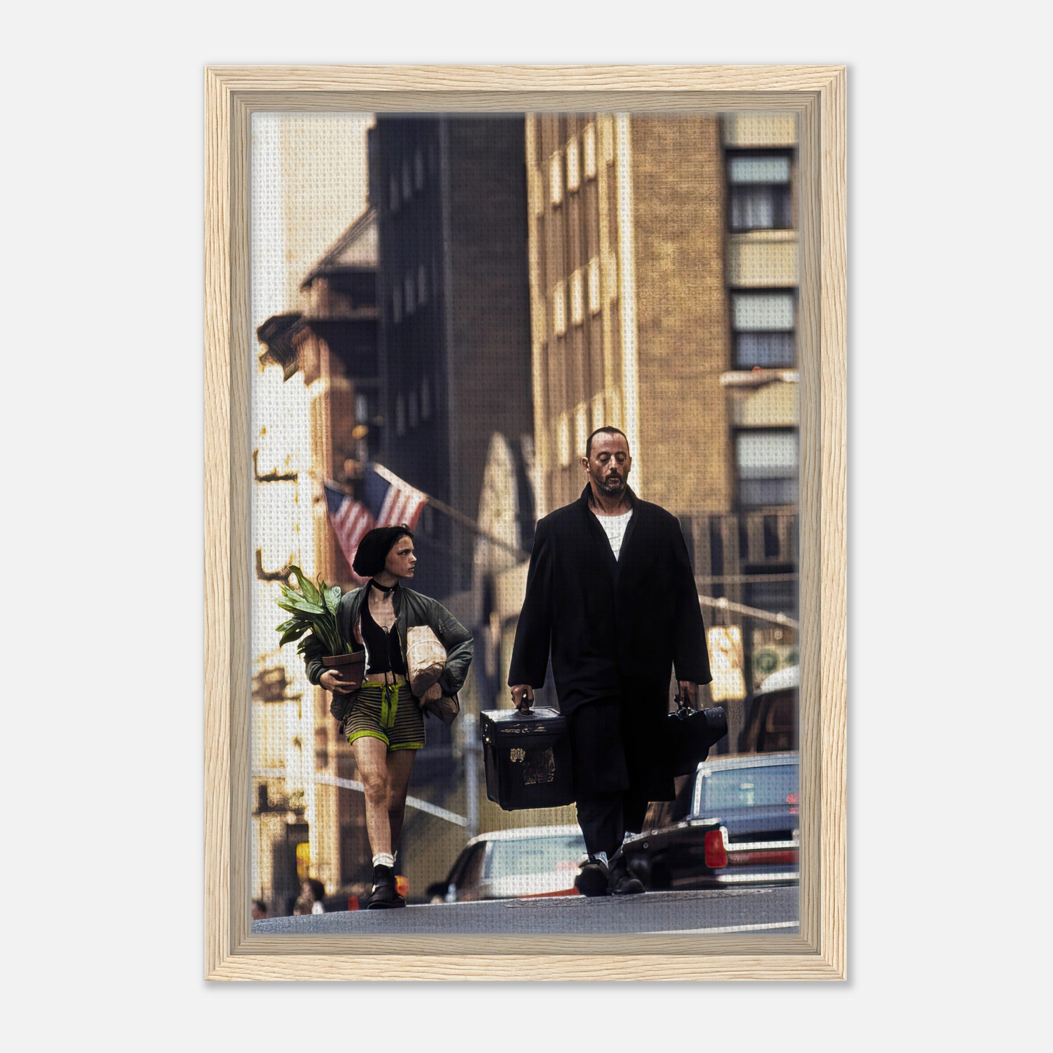 Jean Reno and Natalie Portman walking in a city scene from Leon, framed canvas print capturing cinematic artistry.