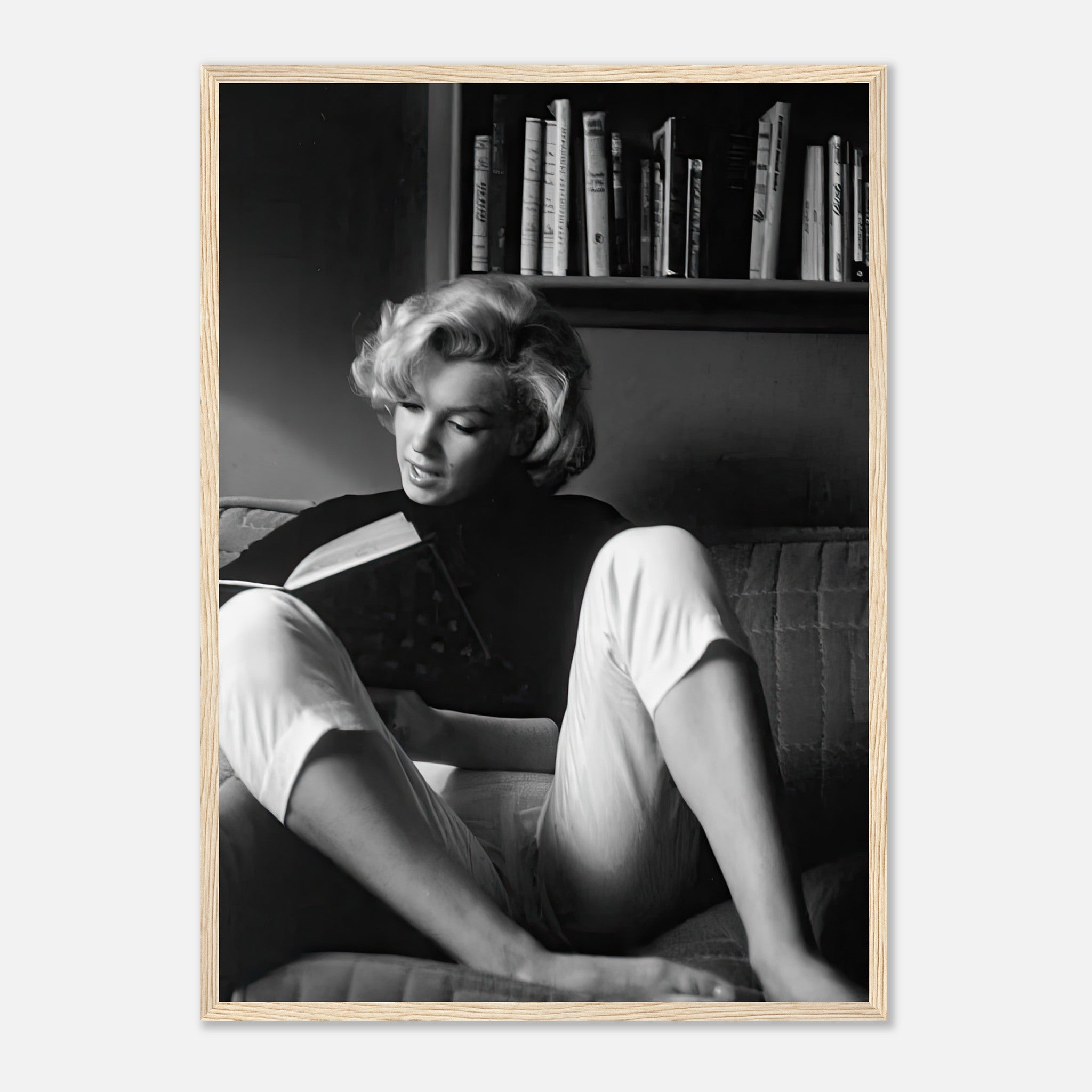 Marilyn Monroe framed print, reading at home, classic Hollywood glamour, elegant black-and-white image.