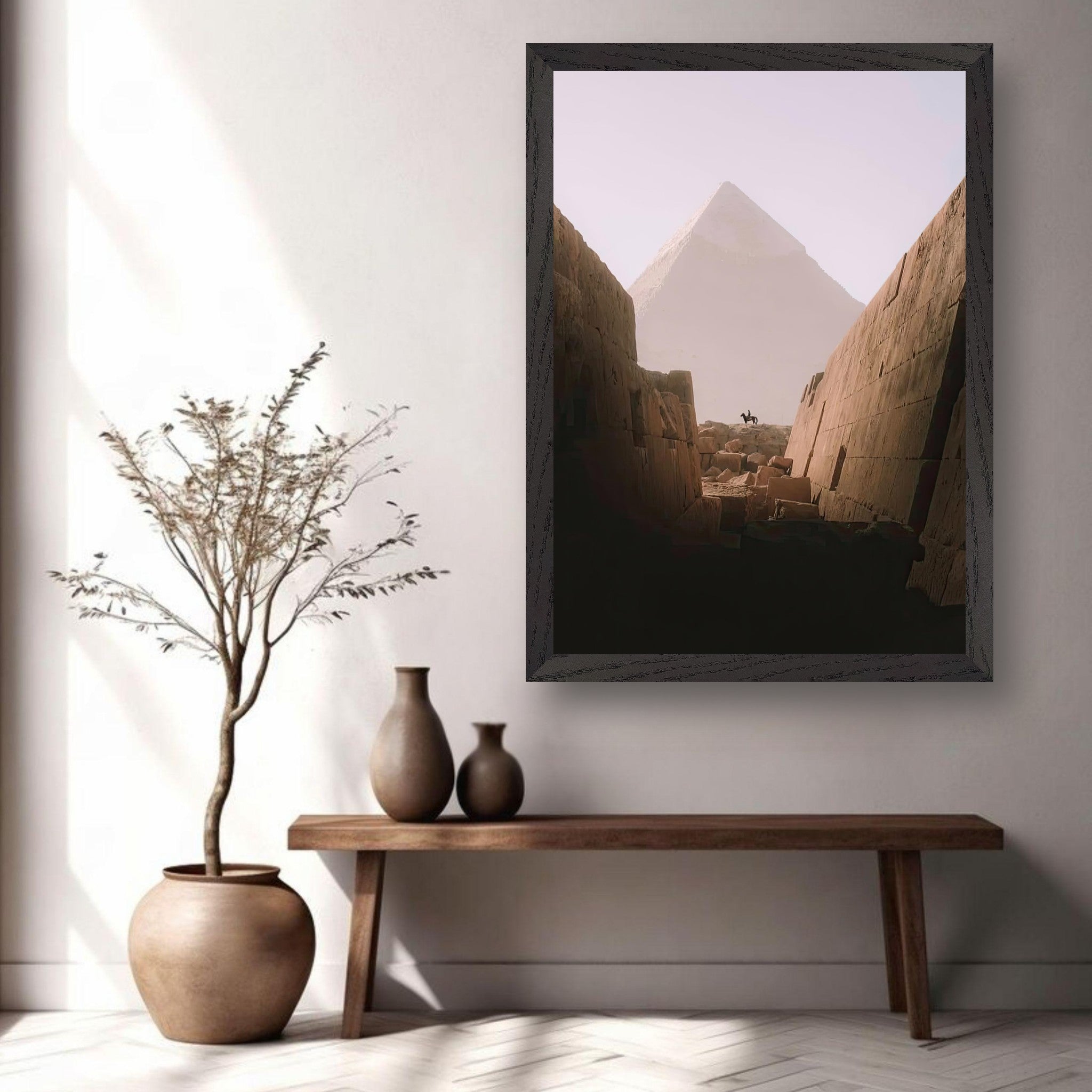 Vintage framed print of the Great Pyramid of Giza in a modern interior setting with plants and decor.
