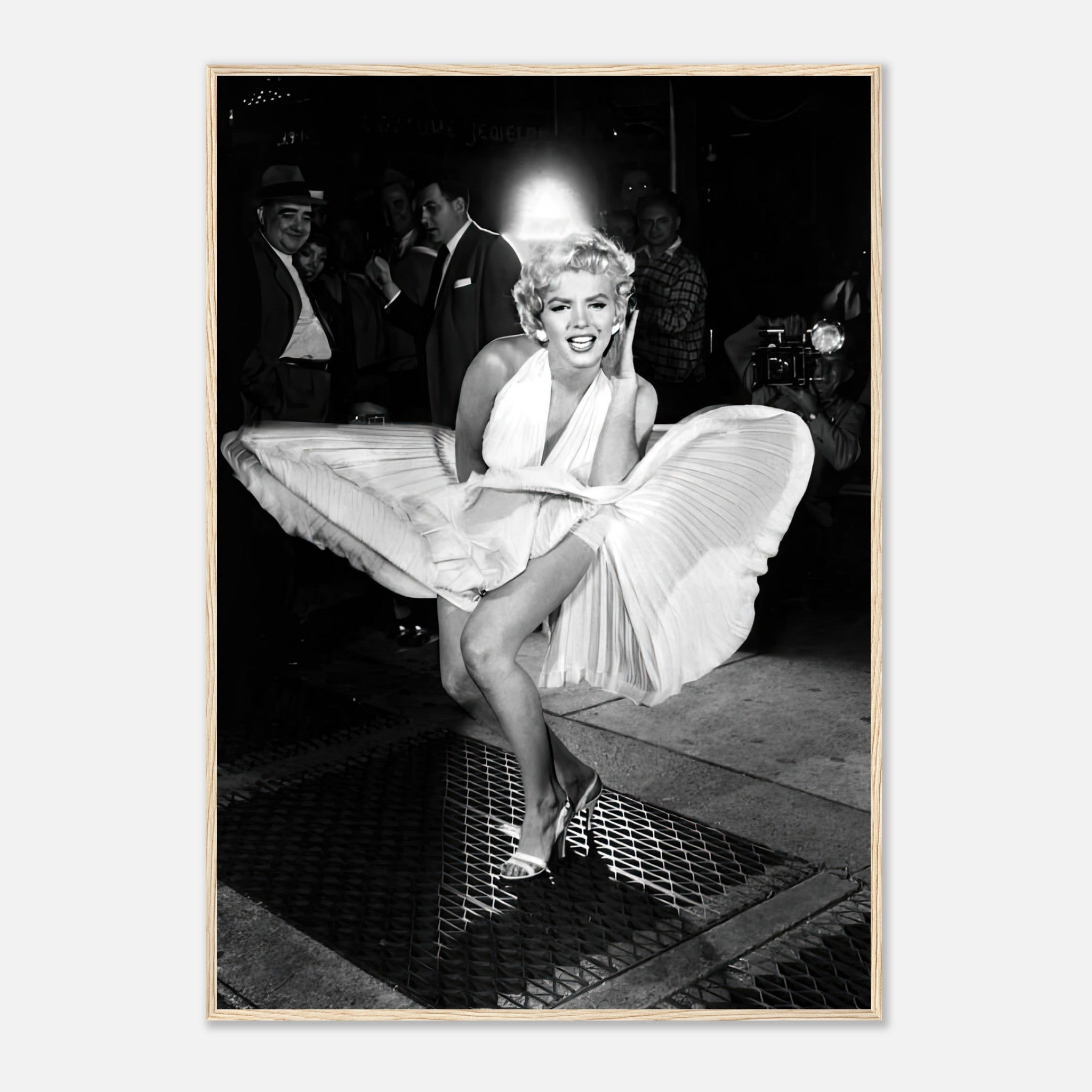 Marilyn Monroe in white dress over subway grate, iconic wind-blown moment from The Seven Year Itch, framed print.